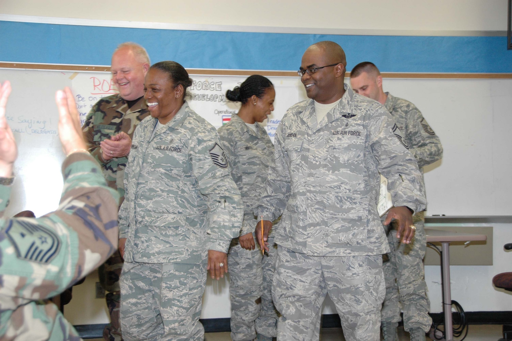MCGUIRE AIR FORCE BASE, N.J. -- Attendees of the Senior NCO Leadership Development Course receive applause from peers for their presentation describing their learning experience in the weekend-long course. The Air Force Reserve Command course, held here for the first time in April, provides SNCOs the chance to explore in-depth communications, trust, teamwork and leadership issues and initiatives. (U.S. Air Force photo/Staff Sgt. Monica L. Dalberg)