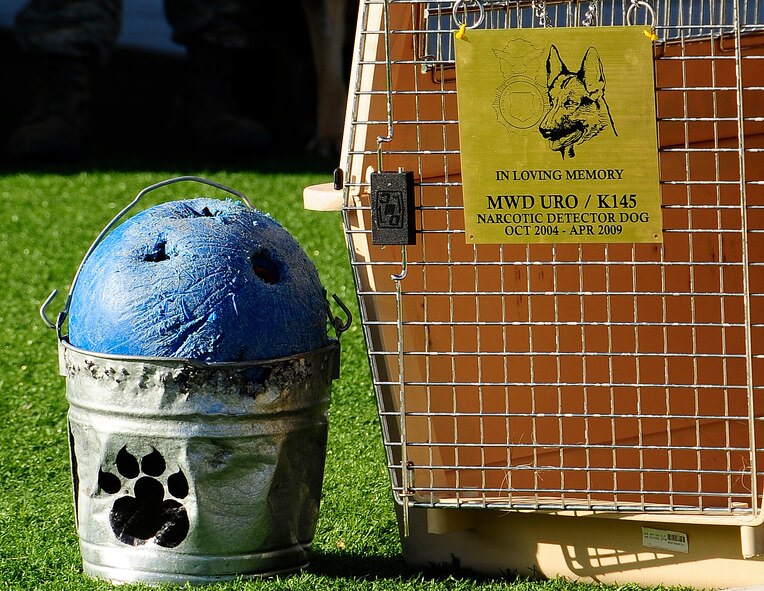 Military Working Dog Uro's chew toy and water bucket are displayed at a memorial service May 1 honoring the four year-old German Shepherd. Uro died April 24 at Holloman Air Force Base, N.M. Uro arrived at Holloman in September 2006. (U.S. Air Force photo/Tech. Sgt. Chris Flahive)