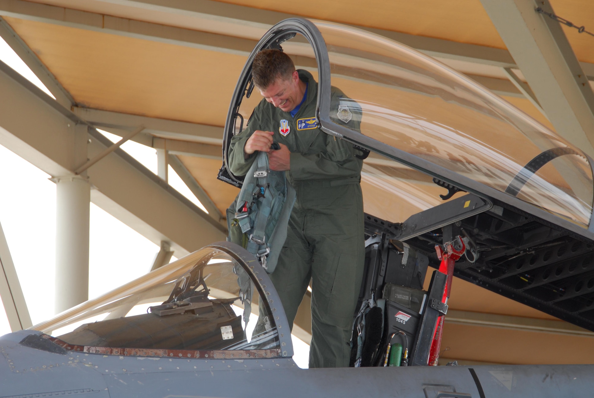 Col. Randy Spear, 601st Air and Space Operations Center vice commander, exits his F-15 after taking his final flight. (Air Force Photo by: Ms. Lisa Norman)