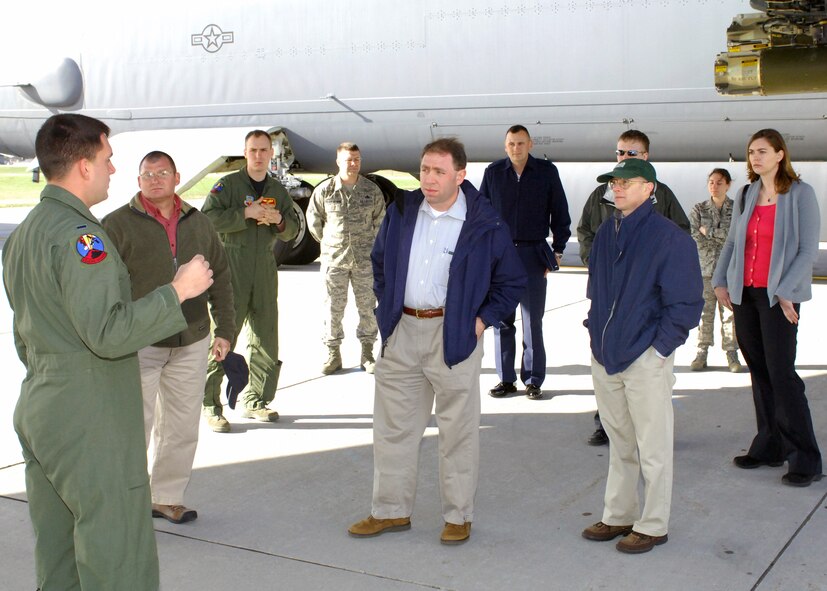 MINOT AIR FORCE BASE, N.D. -- 1st Lt. Richard Marby, 23rd Bomb Squadron B-52H Stratofortress co-pilot, discusses the capabilities of the B-52 with analysts of the National Geospatial Intelligence Agency (NGA) during their tour here May 4.  The NGA visited the base to help familiarize themselves with the day-to-day operations of a bomber base and its personnel. (U.S. Air Force photo by Staff Sgt. Keith Ballard)
