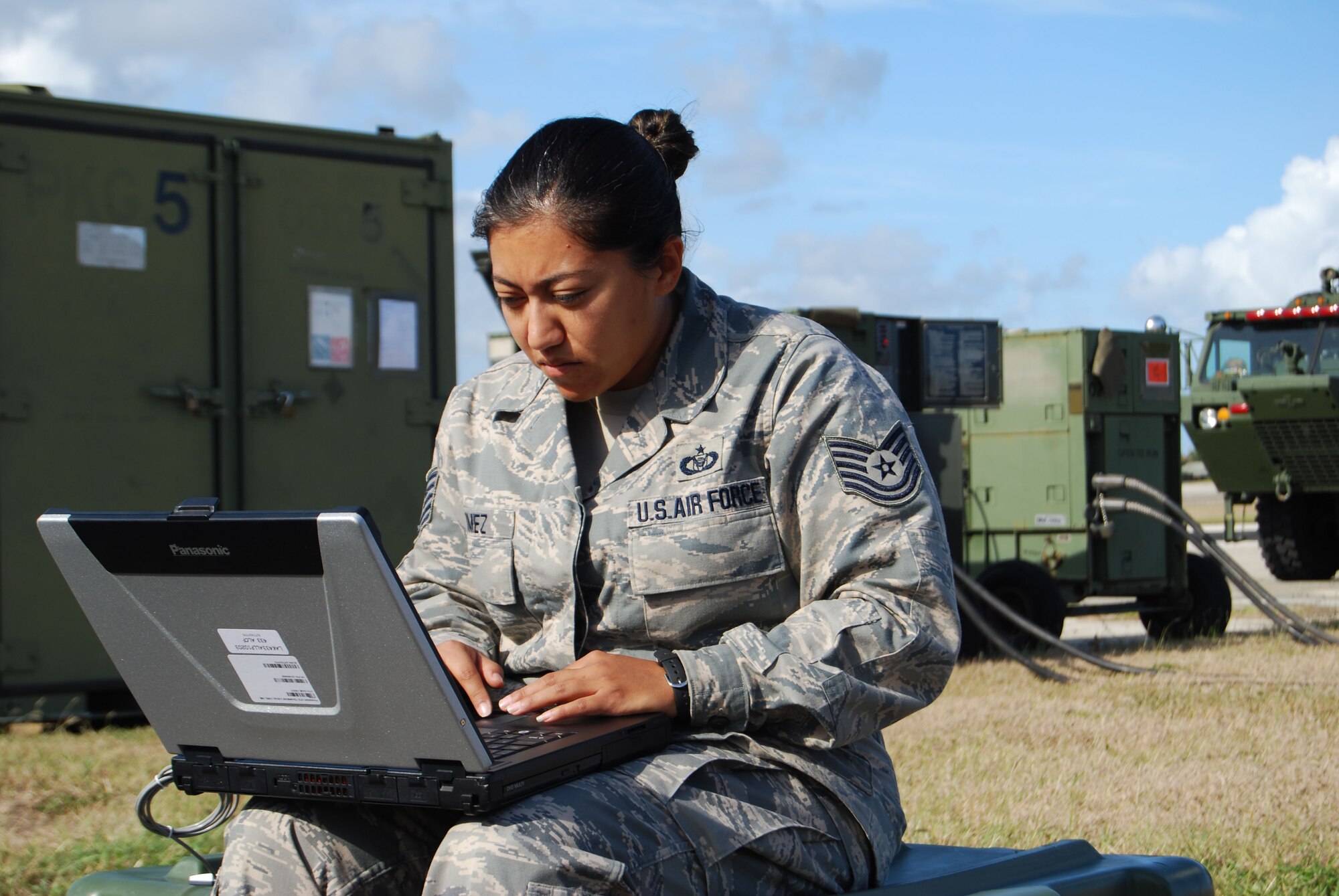 Tech. Sgt. Marisol Gomez, an airlift control specialist from the 433rd Airlift Control Flight, checks her laptop web connectivity before the 2009 Patriot Hoover training exercise. The excercise is a chance to test interagency operability between the Alamo Wing, Puerto Rico Air National Guard and the FBI. (U.S. Air Force Photo/Staff Sgt. Carlos Trevino)