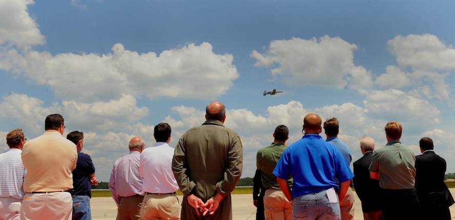 MOODY AIR FORCE BASE, Ga. -- The 23rd Wing Honorary Commanders watch an A-10C Thunderbolt II, from the A-10 East Coast Demo Team, perform aerobatic maneuvers during the Honorary Commander’s Day visit here April 30. (U.S. Air Force photo by Senior Airman Gina Chiaverotti)