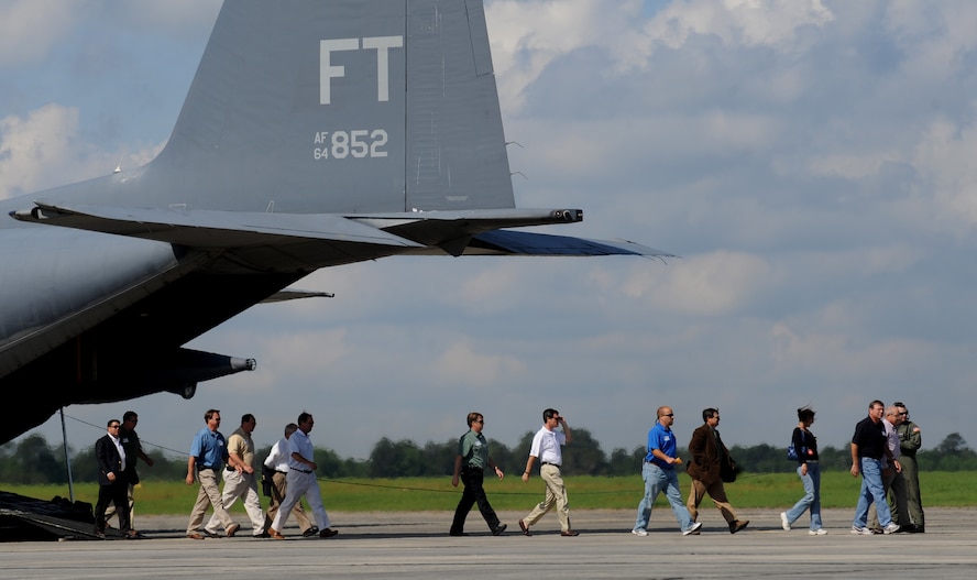MOODY AIR FORCE BASE, Ga. -- The 23rd Wing Honorary Commanders debark from an HC-130P/N Combat King aircraft after processing through a simulated pre-deployment line during the Honorary Commander’s Day visit here April 30. The Honorary Commanders are community leaders from Valdosta and the surrounding area. (U.S. Air Force photo by Senior Airman Gina Chiaverotti)