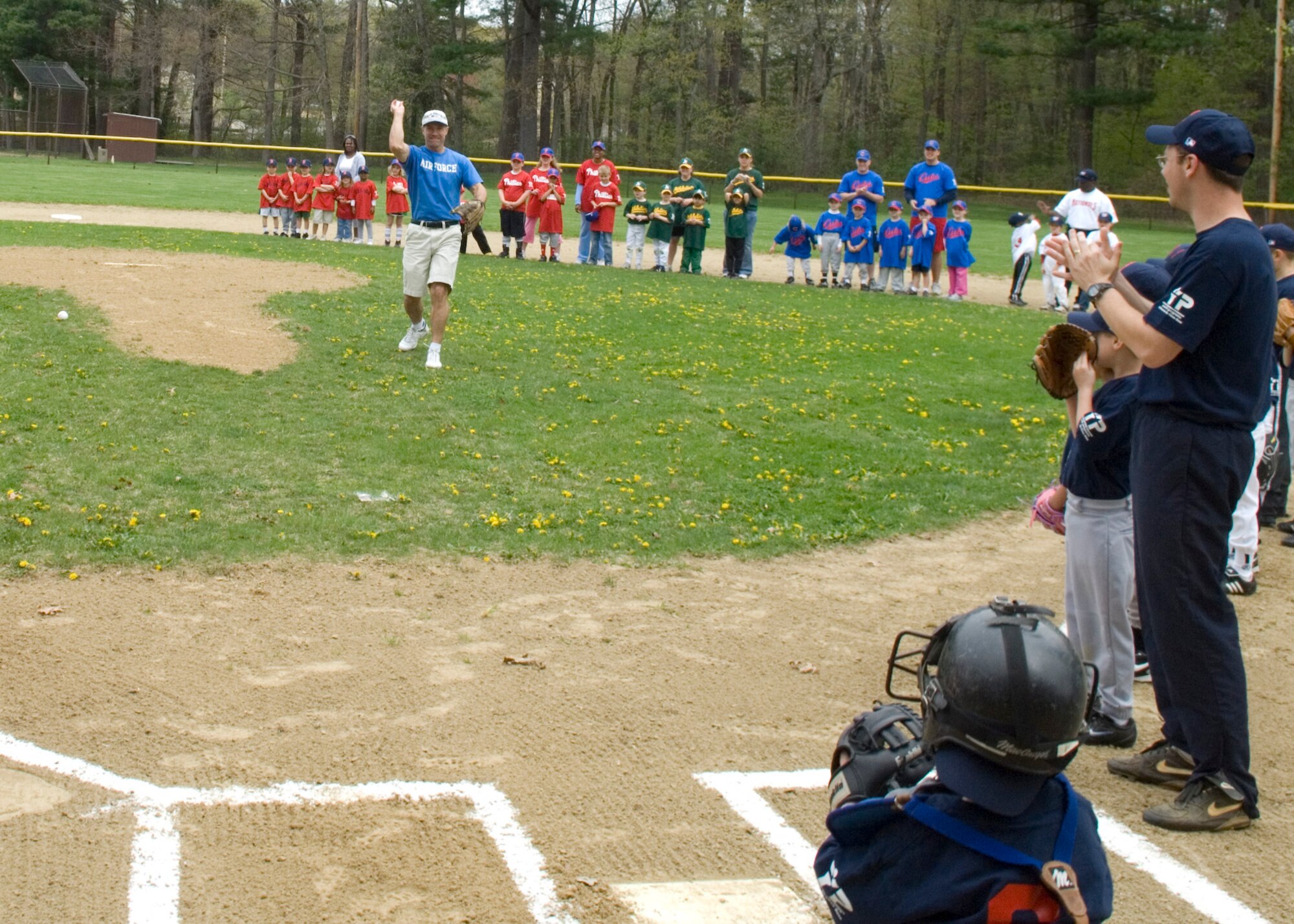 HANSCOM AIR FORCE BASE, Mass. – Col. Dave Orr, 66th Air Base Wing commander throws out the first pitch of the season during the Hanscom Little League season opener on May 2. (U.S. Air Force photo by Rick Berry)