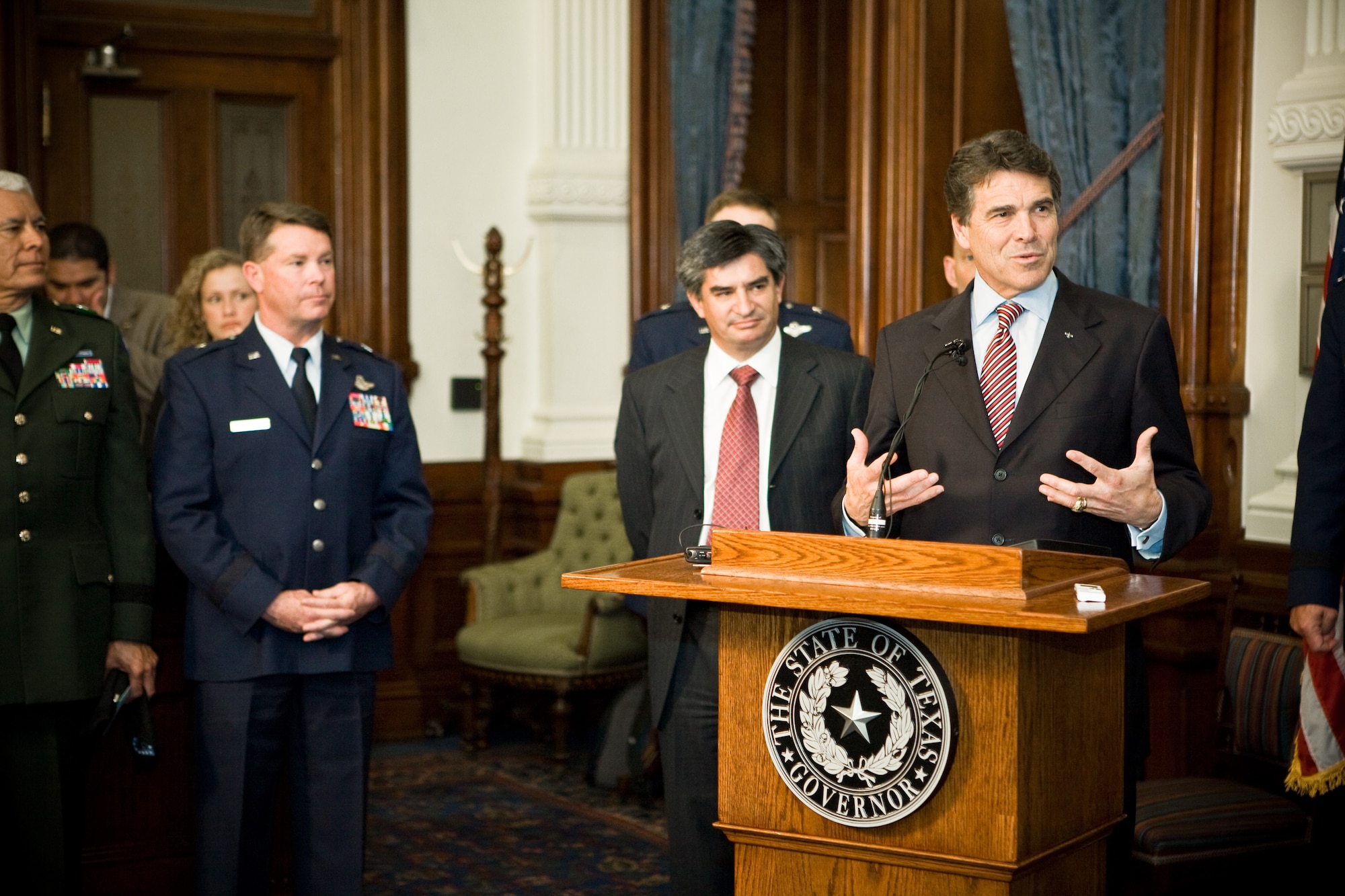 AUSTIN, Texas -- Texas Governor Rick Perry speaks to the distinguished visitors during the signing of a State Partnership Proclamation April 27.  (Air National Guard photo by Staff Sgt. Eric Wilson)