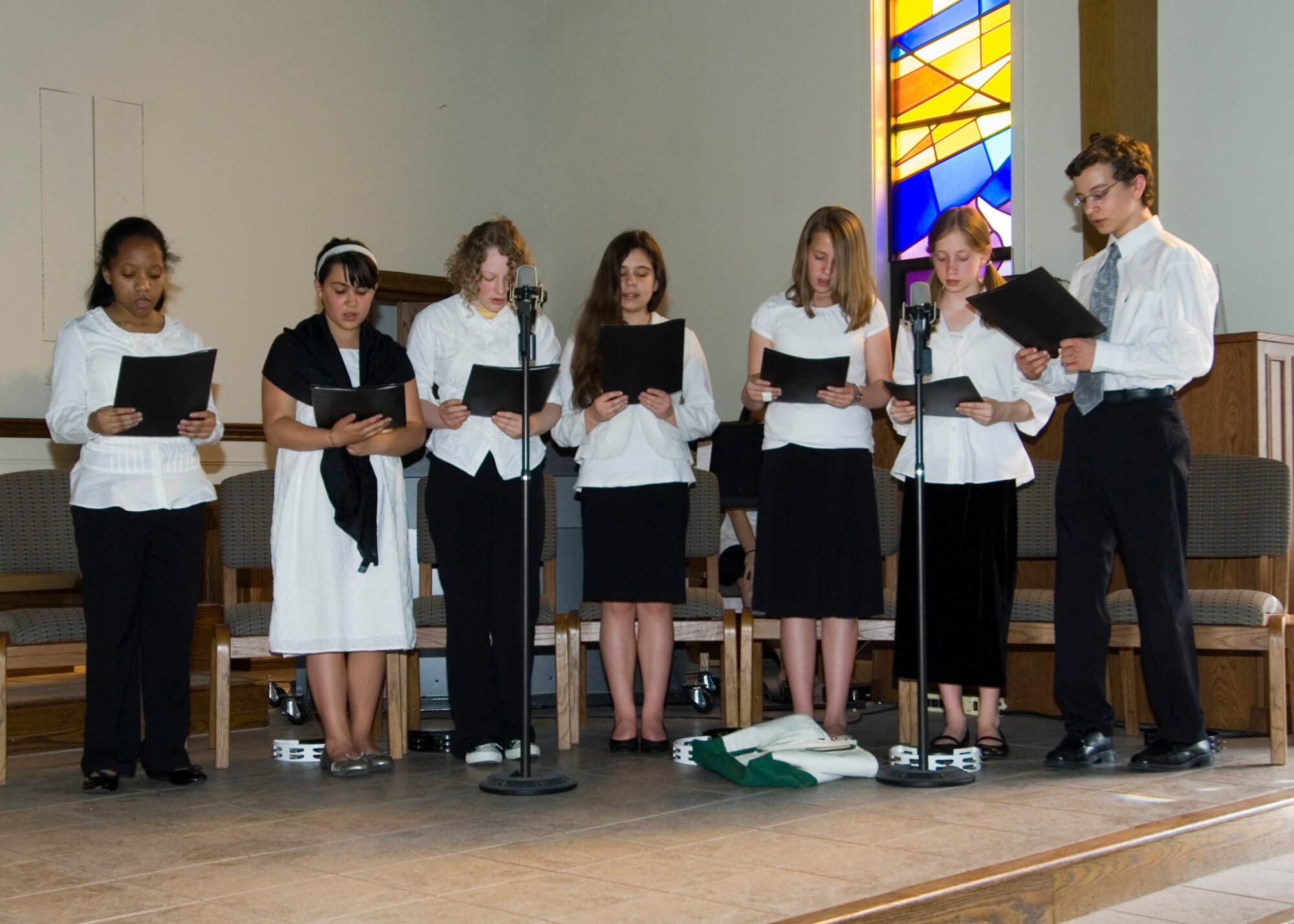 HANSCOM AIR FORCE BASE, Mass. – Hanscom Middle School Chorus members participate in the April 28, “Of the Shtetl We Sing: European Jewry before Kristallnacht,” Holocaust Remembrance event at the Base Chapel. The event featured special presentations by Howard Worona, Hanscom Middle School music specialist and members of the school chorus, in addition to readings by Rabbi Abraham Morhaim. (U.S. Air Force photo by Rick Berry)