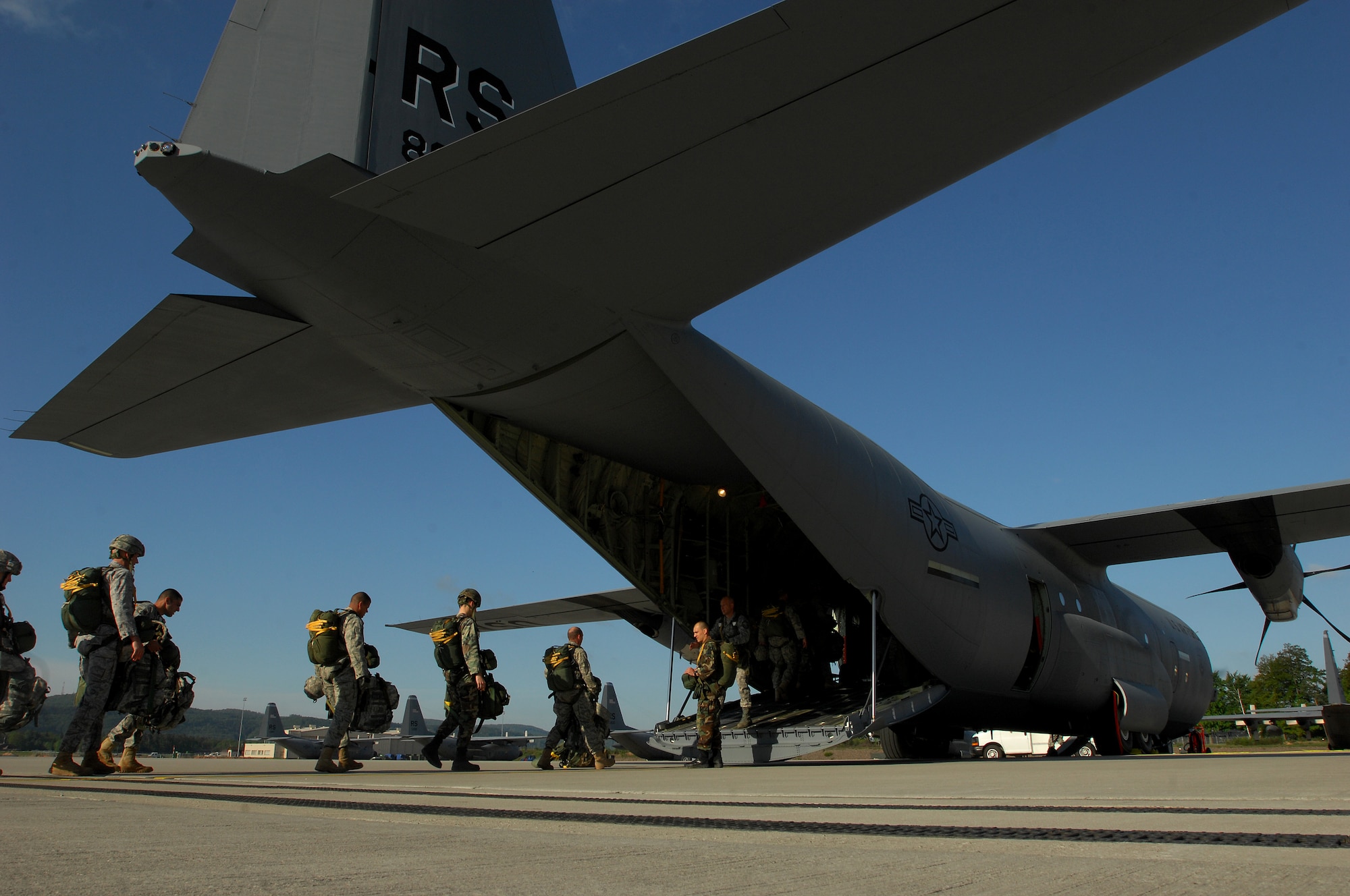 United States Air Force and Army paratroopers load Ramstein's new C-130J for the first Super Hercules personnel drop, May 4, 2009 Ramstein Air Base, Germany. (U.S. Air Force photo by Senior Airman Kenny Holston)
