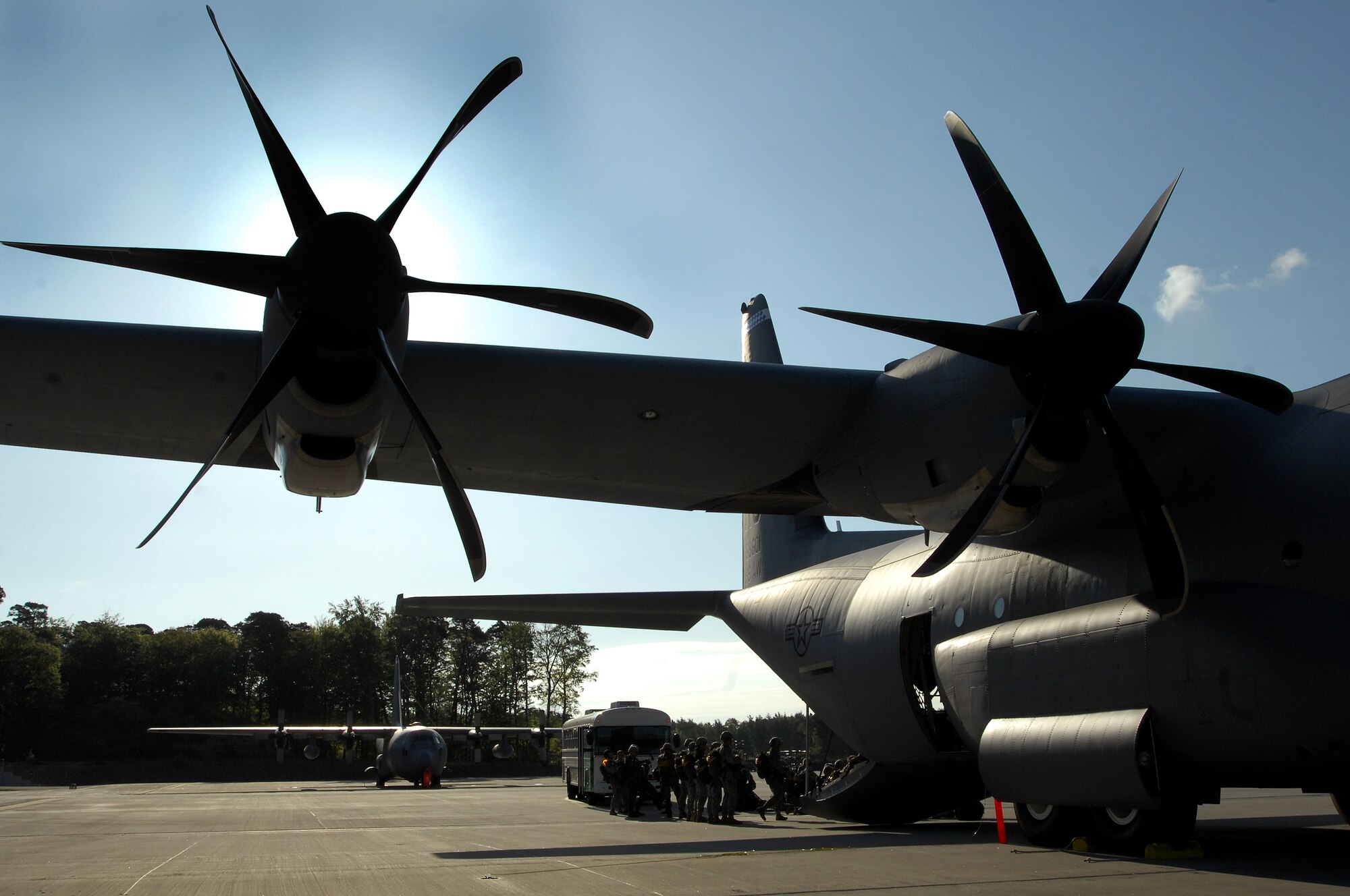 United States Air Force and Army paratroopers prepare to load Ramstein's new C-130J for the first Super Hercules personnel drop, May 4, 2009 Ramstein Air Base, Germany. (U.S. Air Force photo by Senior Airman Kenny Holston)
