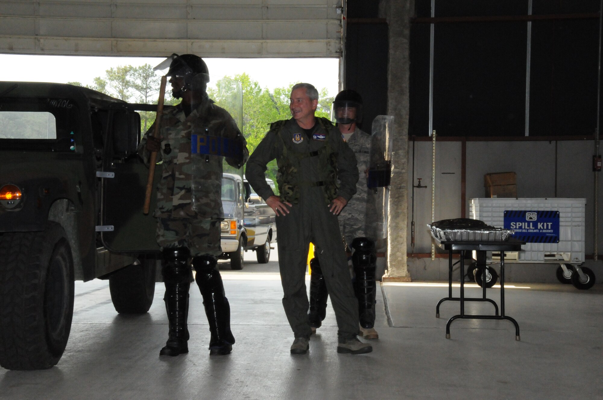 SEYMOUR JOHNSON AIR FORCE BASE, N.C. -- Col. Fritz Linsenmeyer, commander of the 916th Air Refueling Wing, is escorted in during under cover during the wing's combat dining in. More than 175 reservists and active duty members participated in the event.