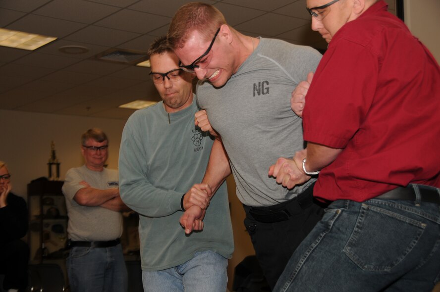 Staff Sergeant Casey Floyd cringes after being hit with a Taser during training at the 185th Air Refueling Wing in Sioux City, Iowa.  Floyd is assigned to the185th Air Refueling Wing Security Forces Squadron in Sioux City, Iowa.

Air Force Photo by: MSgt Vincent De Groot 185th ARW Public Affairs
