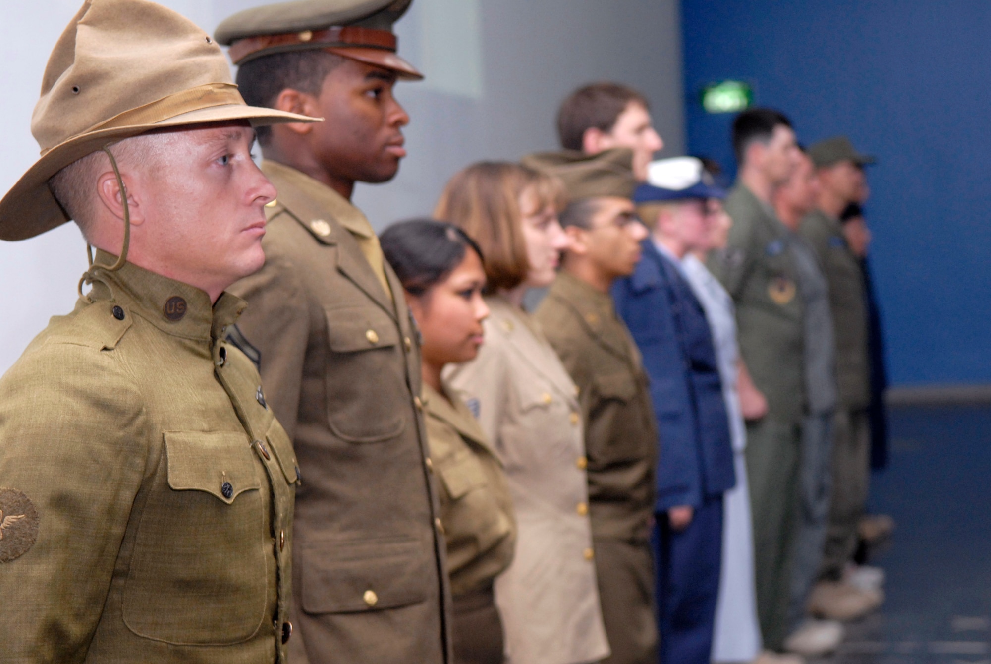 Airmen modeling historical Air Force uniforms line up during Operation Uniform Delta, April 27, 2009, at an undisclosed location in Southwest Asia.  Operation Uniform Delta was an event displaying the history of the Air Force uniform and the changes that it underwent through the years.  The Airmen who participated in this event are deployed in support of Operations Iraqi and Enduring Freedom and Combined Joint Task Force - Horn of Africa.  (U.S. Air Force photo/Senior Airman Andrew Satran/released)