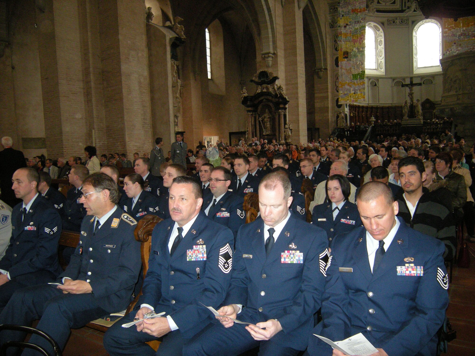 TRIER, Germany – Airmen from the 52nd Fighter Wing join German servicemembers and civilians for a “Holy Robe Days” World Day of Peace ceremony in the Trier Cathedral April 30, 2009. Once a year, the Trier diocese hosts the "Holy Robe Days" as the most important diocesan festival in Trier. People join in the celebrations, which include worship services, target group programs, conversations and meditation, cultural events and pilgrims' routes. (Photo by Connie Pitsch)
