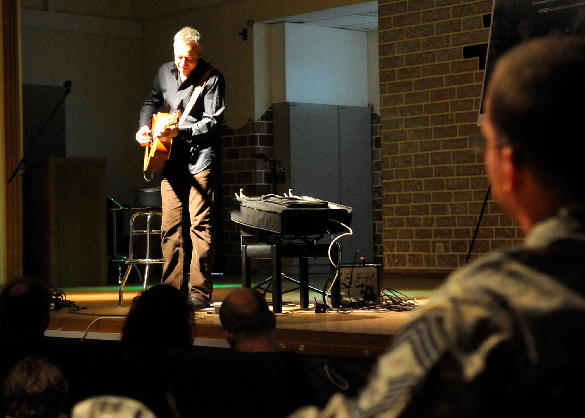 SPANGDAHLEM AIR BASE, Germany – Guitarist Tommy Emmanuel, two-time Grammy nominee, performs at the Brick House April 29, 2009. In addition to his 16 music and instructional recordings, Emmanuel is also an accomplished record producer and musical arranger. (U.S. Air Force photo by Airman 1st Class Staci Miller)