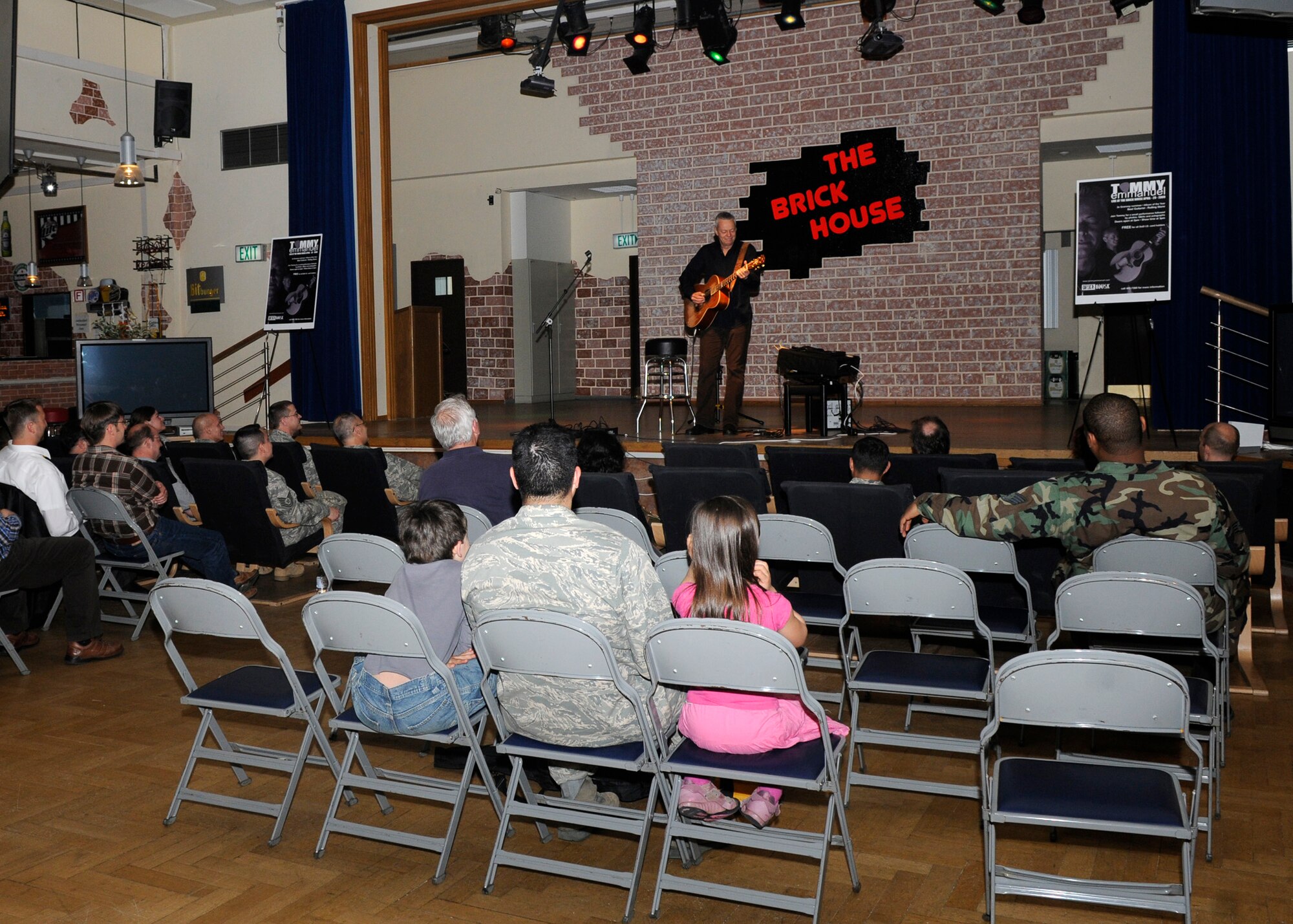 SPANGDAHLEM AIR BASE, Germany – Guitarist Tommy Emmanuel, two-time Grammy nominee, performs at the Brick House April 29, 2009. In addition to his 16 music and instructional recordings, Emmanuel is also an accomplished record producer and musical arranger. (U.S. Air Force photo by Airman 1st Class Staci Miller)