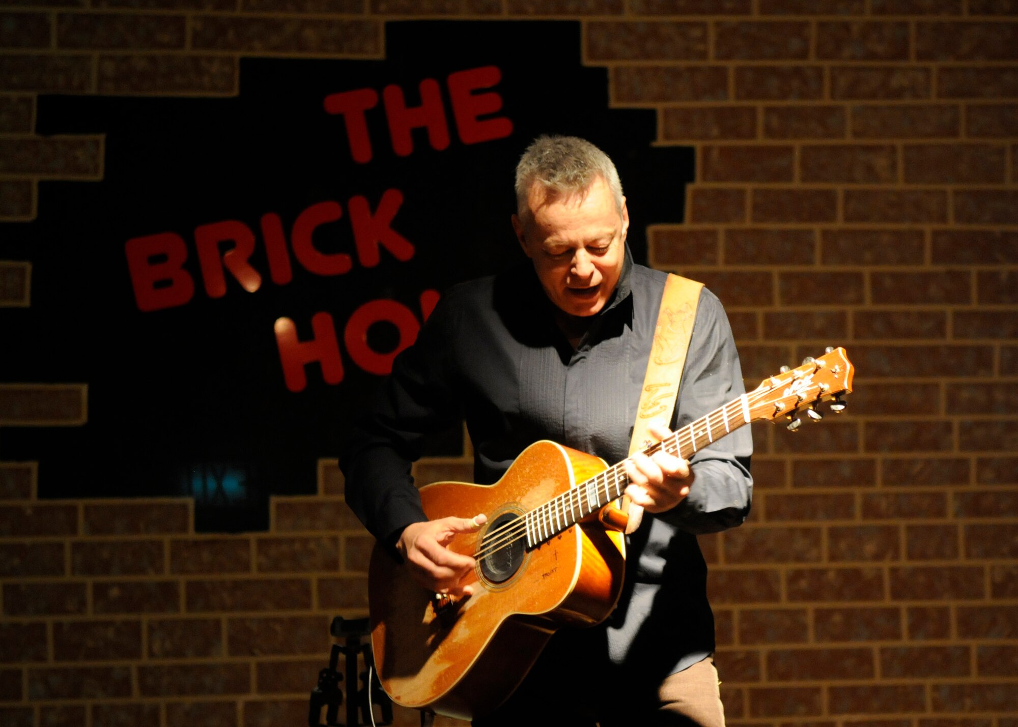 SPANGDAHLEM AIR BASE, Germany – Guitarist Tommy Emmanuel, two-time Grammy nominee, performs at the Brick House April 29, 2009. In addition to his 16 music and instructional recordings, Emmanuel is also an accomplished record producer and musical arranger. (U.S. Air Force photo by Airman 1st Class Staci Miller)