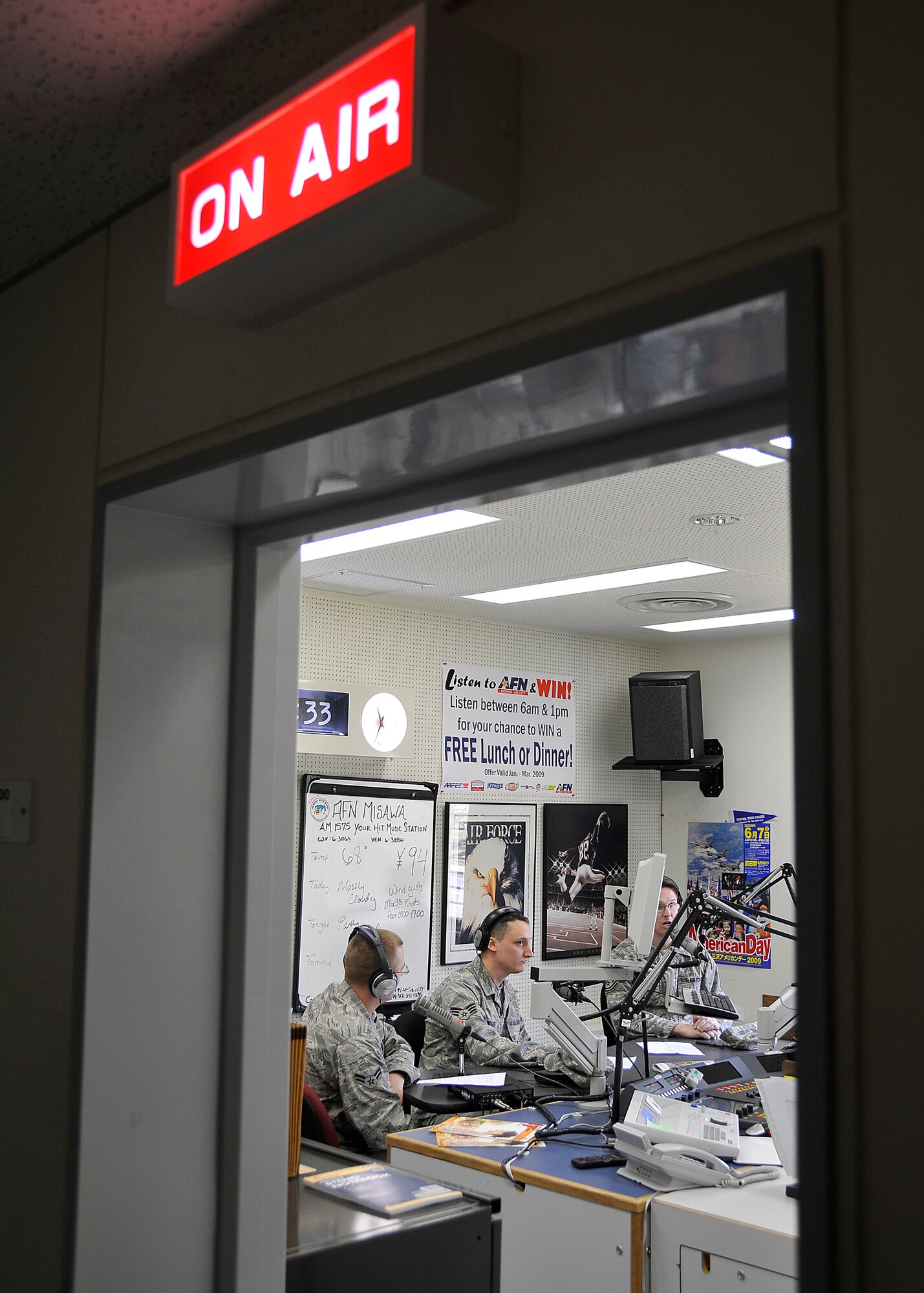 Airman 1st Class Long, Senior Airman Emrys Maier, and Tech Sgt. Erick Tyndall, all from the 35th Communications Squadron, offer live assistance on their radio show the geek squad May 1, 2009. The radio show covered everything regarding "tweaking" computer performance.  (U.S. Air Force photo by Senior Airman Chad Strohmeyer)