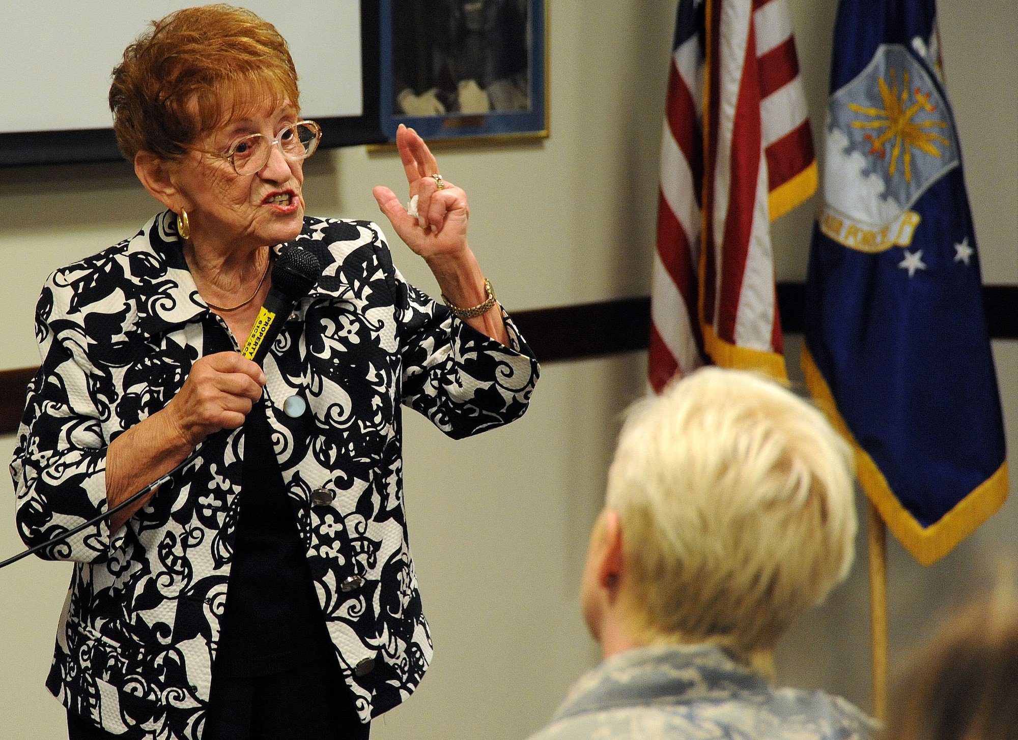 Regina Hirsch, a Holocaust survivor, shares her experiences living with her family and friends in the Lodz Jewish Ghetto in Poland and Theresienstadt Concentration Camp, located in what is now the Czech Republic, at Los Angeles Air Force Base, May 5.  Her visit here was sponsored by the Chaplain’s Office. (Photo by Lou Hernandez)