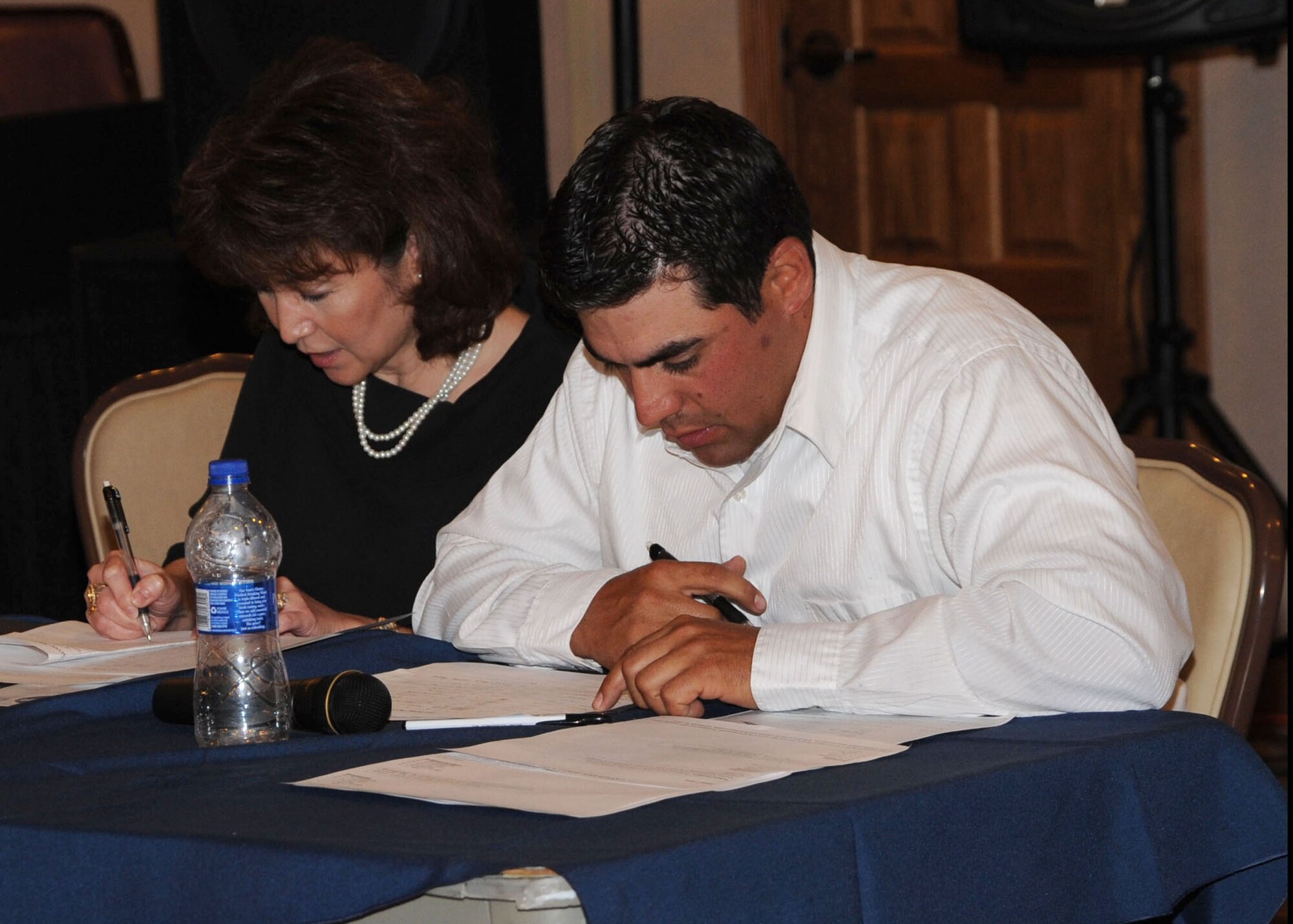 CANNON AIR FORCE BASE, N.M.-- Judges Judy Trimble and Caleb Howl discuss and select the winners of the 2009 Cannon Idol event at the Landing May 5. The winners received up to $300 in cash. (U.S. Air Force photo by Airman 1st Class Maynelinne De La Cruz) 