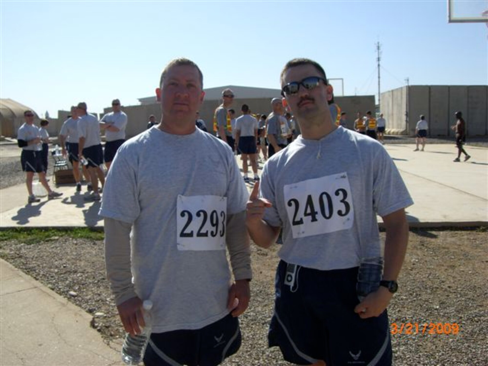 Tech. Sgt. Todd P. Seguin and Tech. Sgt. Sam A. Ruiz ,  both from the119th Wing Security Forces Squadron, North Dakota Air National Guard, prepare for a 5K race while serving in Iraq.  Ruiz plans to run the full Fargo Marathon from Iraq on May 9th and Seguin will run the last six miles with Ruiz to ensure he completes his goal of finishing the race on behalf of the 2009 North Dakota flood victims, volunteers and National Guard members who assisted in the flood fight.
 

