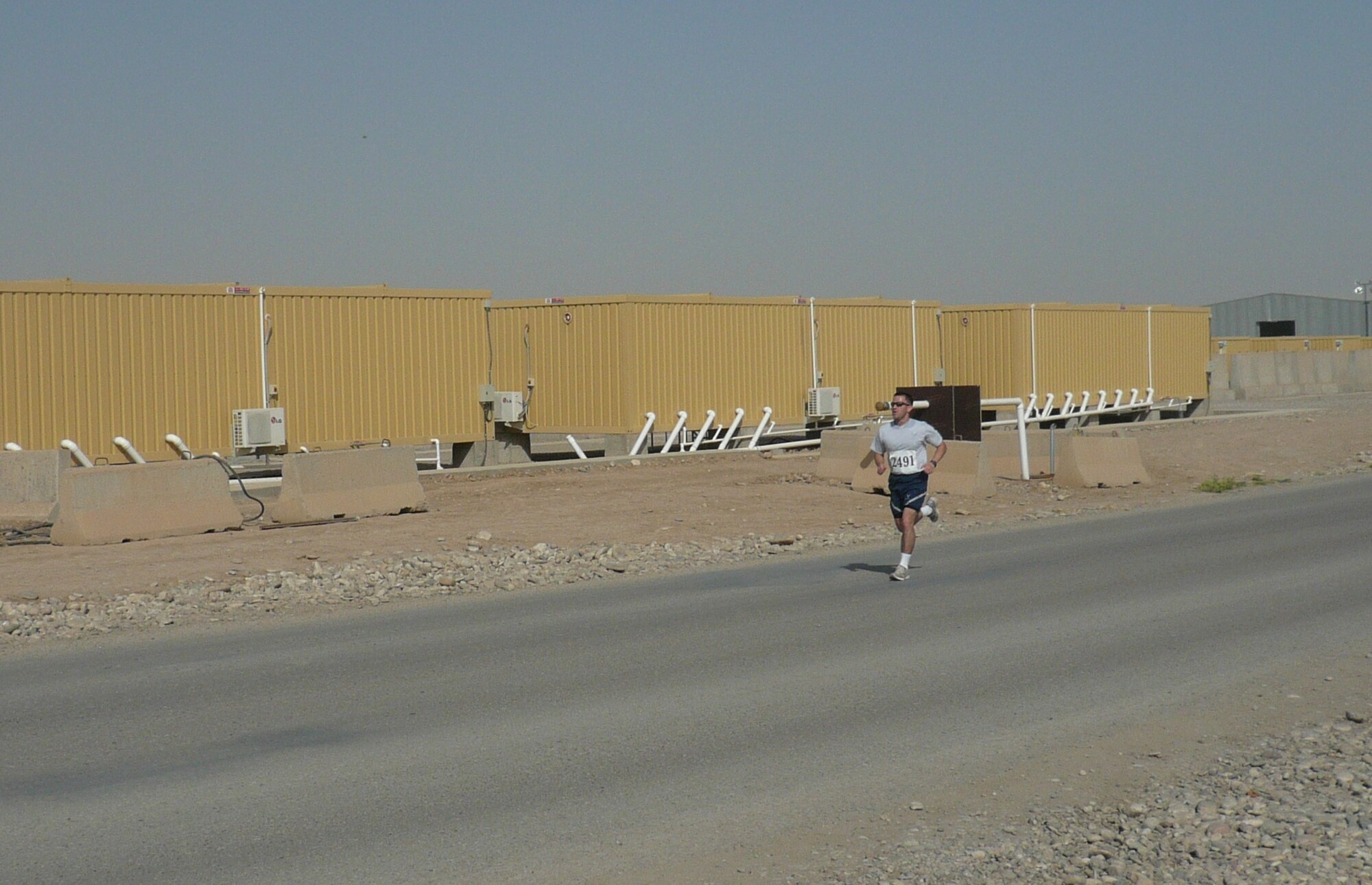 Tech. Sgt. Sam A. Ruiz competes in a 5K race while deployed in Iraq.  Ruiz has run in six races in three months, placing in the top 10 in each race.  He plans to run the Fargo Marathon from Iraq on May 9th on behalf of the 2009 North Dakota flood victims, volunteers and National Guard members who assisted in the flood fight.
 
