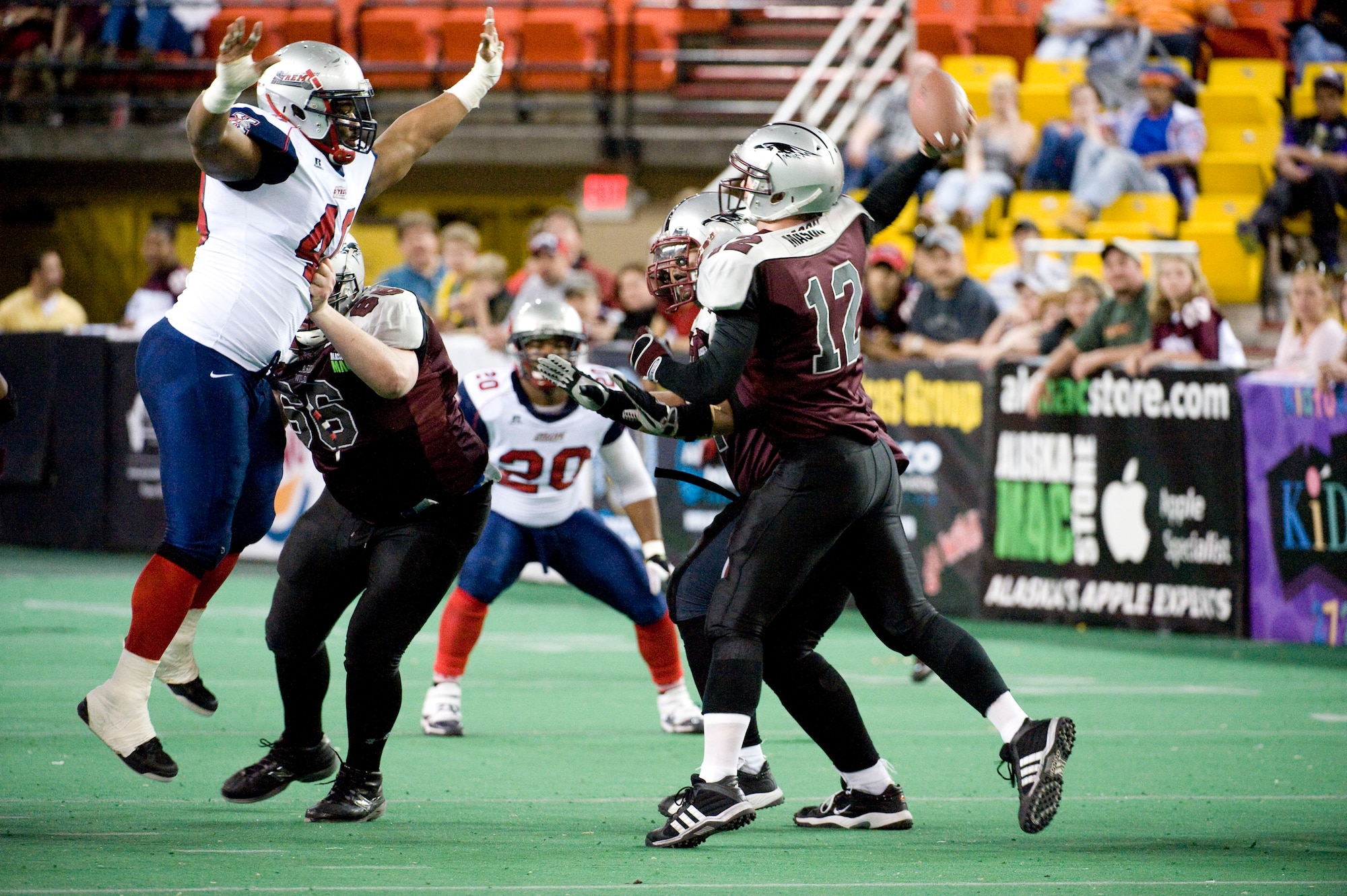 ANCHORAGE, Alaska--Staff Sgt. Earl Mason throws the football down field against the Bloomington Extreme May 4, 2009. Mason is the non-commission officer in charge of emergency management of logistics from the 3rd Civil Engineer Squadron that also plays on Alaska Wild an indoor professional football team. (U.S. Air Force photo/Senior Airman Jonathan Steffen)  