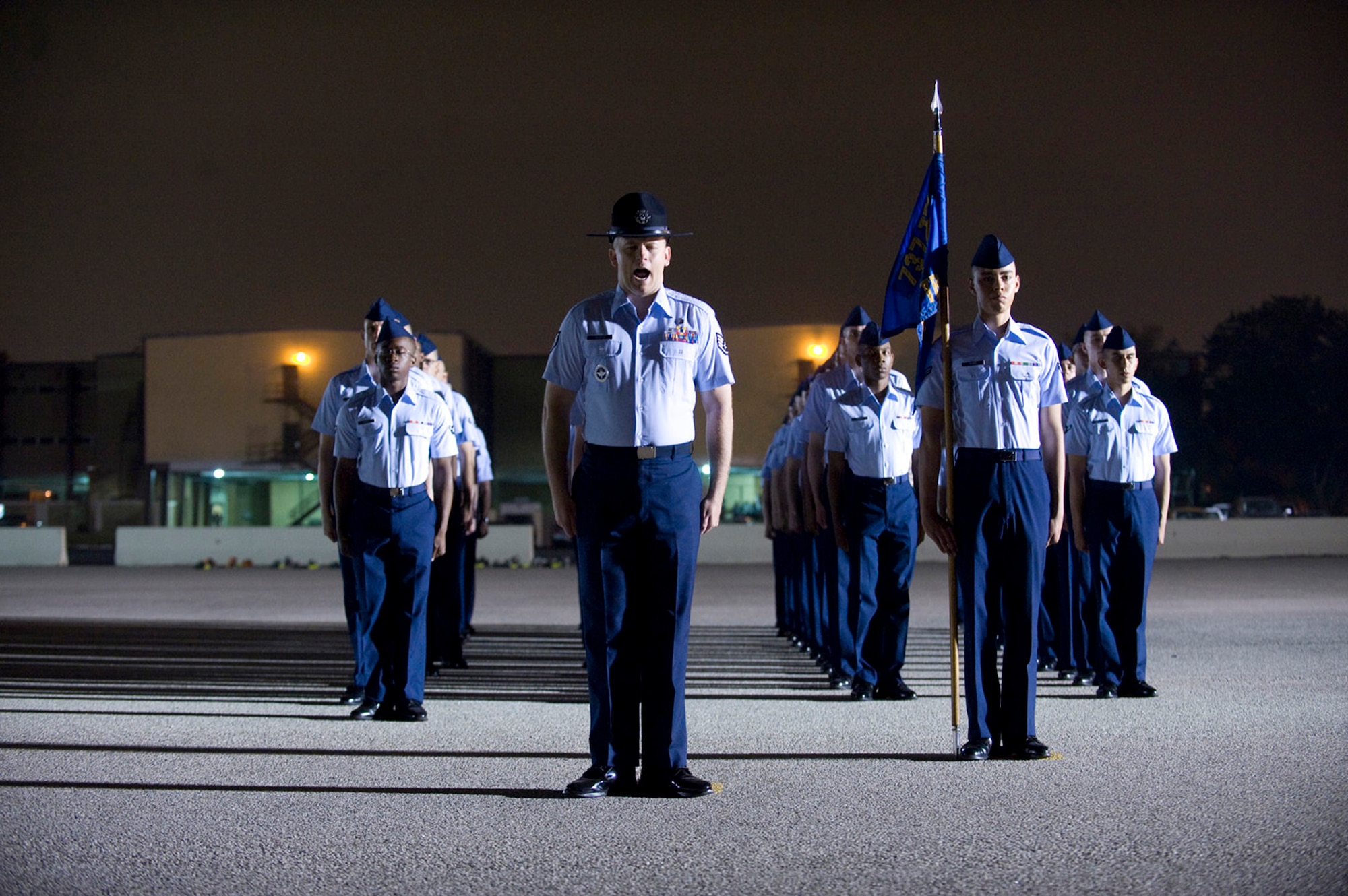 Staff Sgt. Robert George prepares his flight for graduation from Basic Military Training May 1 at Lackland Air Force Base, Texas. Sergeant George is a 324th Training Squadron military training instructor.  (U.S. Air Force photo/Master Sgt. Cecilio Ricardo) 