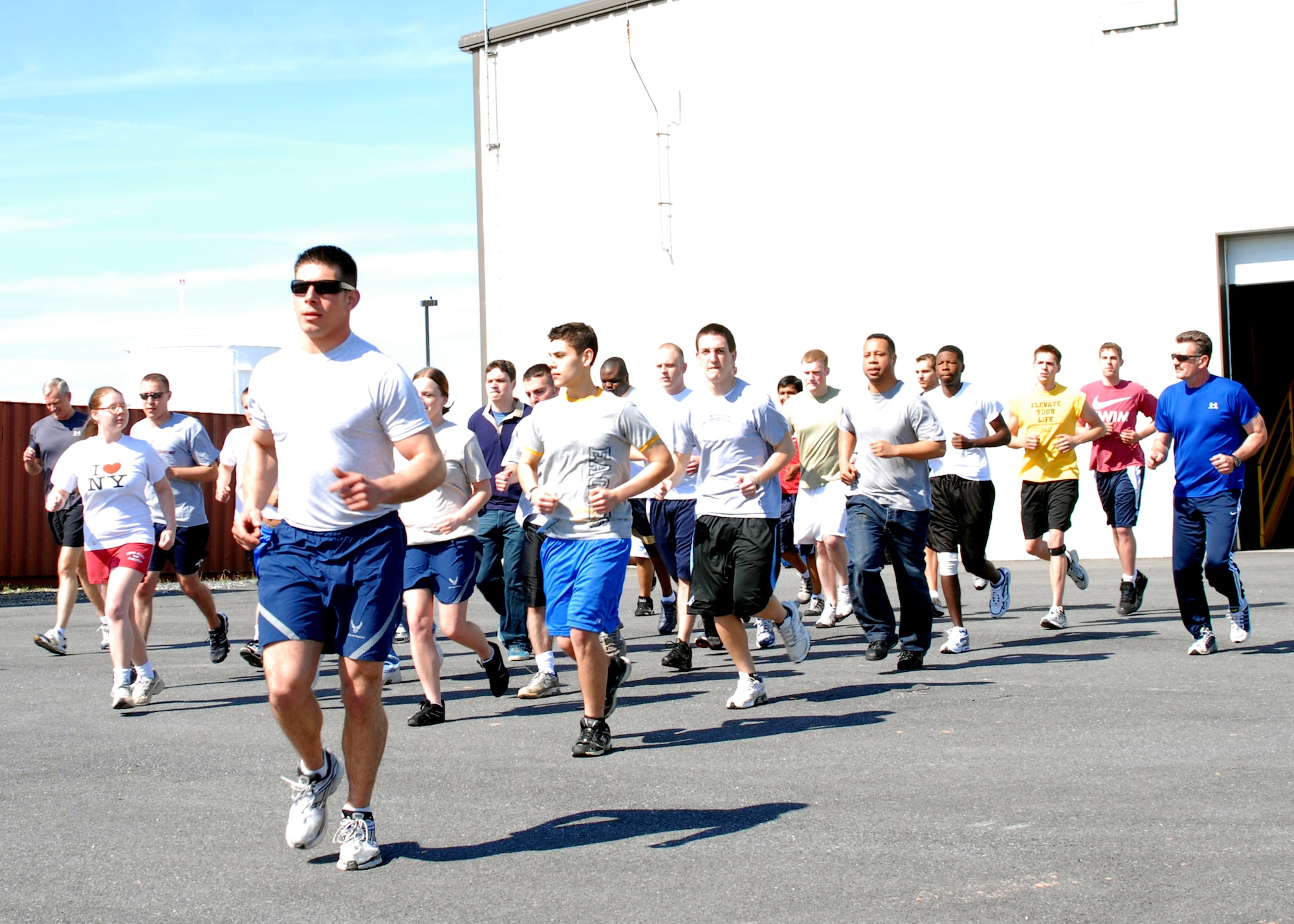 SSgt. Michael DeZinna leads the new student flight on thier first squardon run. The student flight now meets every afternoon for physical training to help improve there chances of completing basic training. Official Photo By: Master Sgt. Edward Bard, 175th Public Affairs, WARFIELD AIR NATIONAL GUARD BASE, Maryland