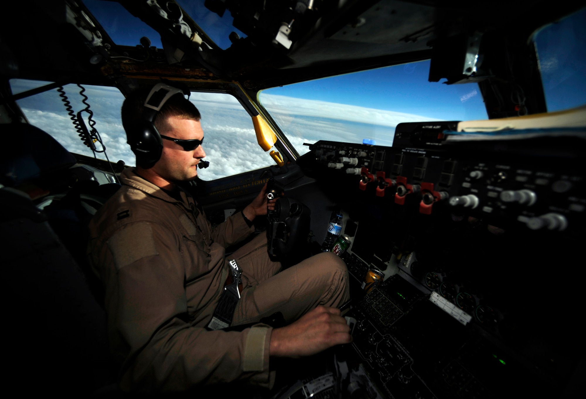 Capt. Micah Vander Veen, assigned to the 340th Expeditionary Air Refueling Squadron at an air base in Southwest Asia, pilots a KC-135 Stratotanker on an air refueling mission in support of Operation Iraqi Freedom.  (U.S. Air Force photo/Staff Sgt. James L. Harper Jr.) 
