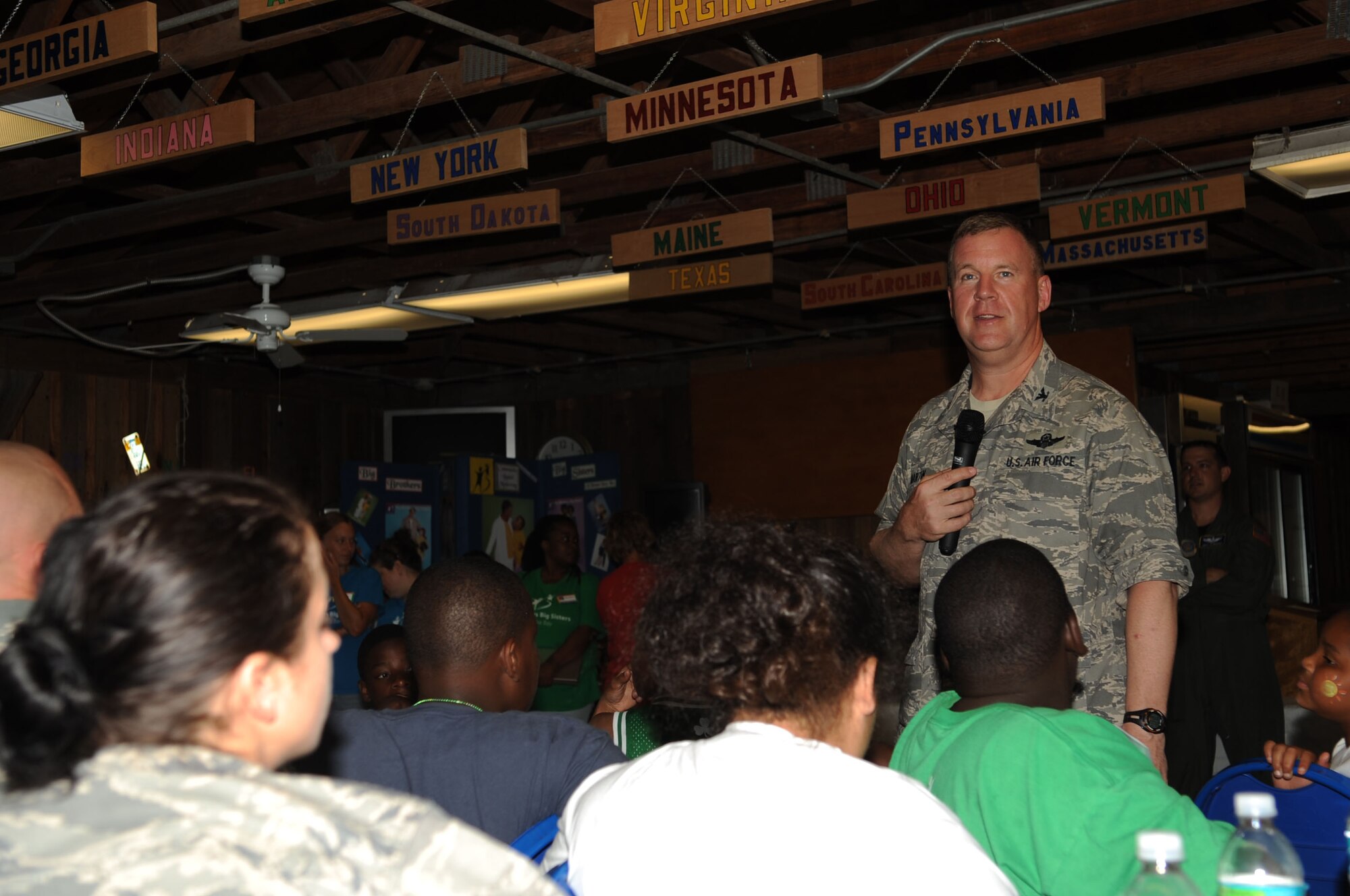 Col Martin Lawrence, 6th Air Mobility Wing Commander, speaks during the ?Big for a Day? Celebration May 1, 2009.  The Big Brothers/Sisters program visits Macdill AFB annually to foster mentorship between local children and base populace, while becoming familiar with 6th Air Mobility Wing mission.  (U.S. Air Force photographer Senior Airman Nancy Hooks)