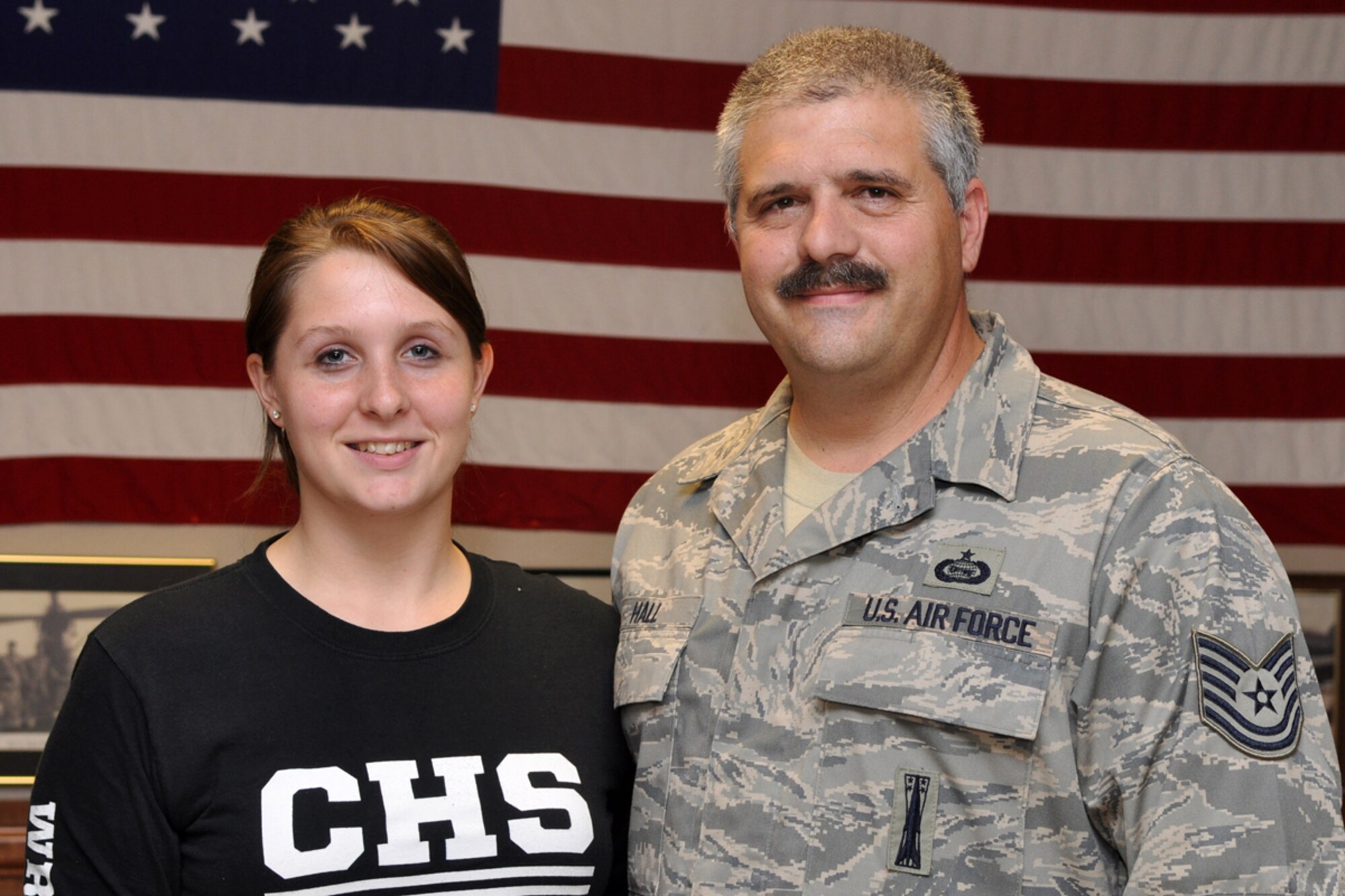 Technical Sgt. Robert Hall and his daughter Jordan Elizabeth Hall knock out two celebrations in one at the 47th Fighter Squadron building May 3, 2009. The Hall family and their guests celebrated both Jordan’s 18th birthday and her appointment letter to the U.S. Air Force Academy. At the age of 12, Jordan decided she wanted to fly the A-10 after a family visit to Hog Smoke 04 in Alexandria, La. She spent four years in the JROTC and time in the Civil Air Patrol preparing to reach her ultimate goal of flying the A-10 Thunderbolt. Jordan graduated from high school in March and reports to the U.S. Air Force Academy on June 25, 2009. Sergeant Hall has been a member of the 917th Wing, 47th FS since September 1997. (US Air Force photo/Tech. Sgt. Jeff Walston)