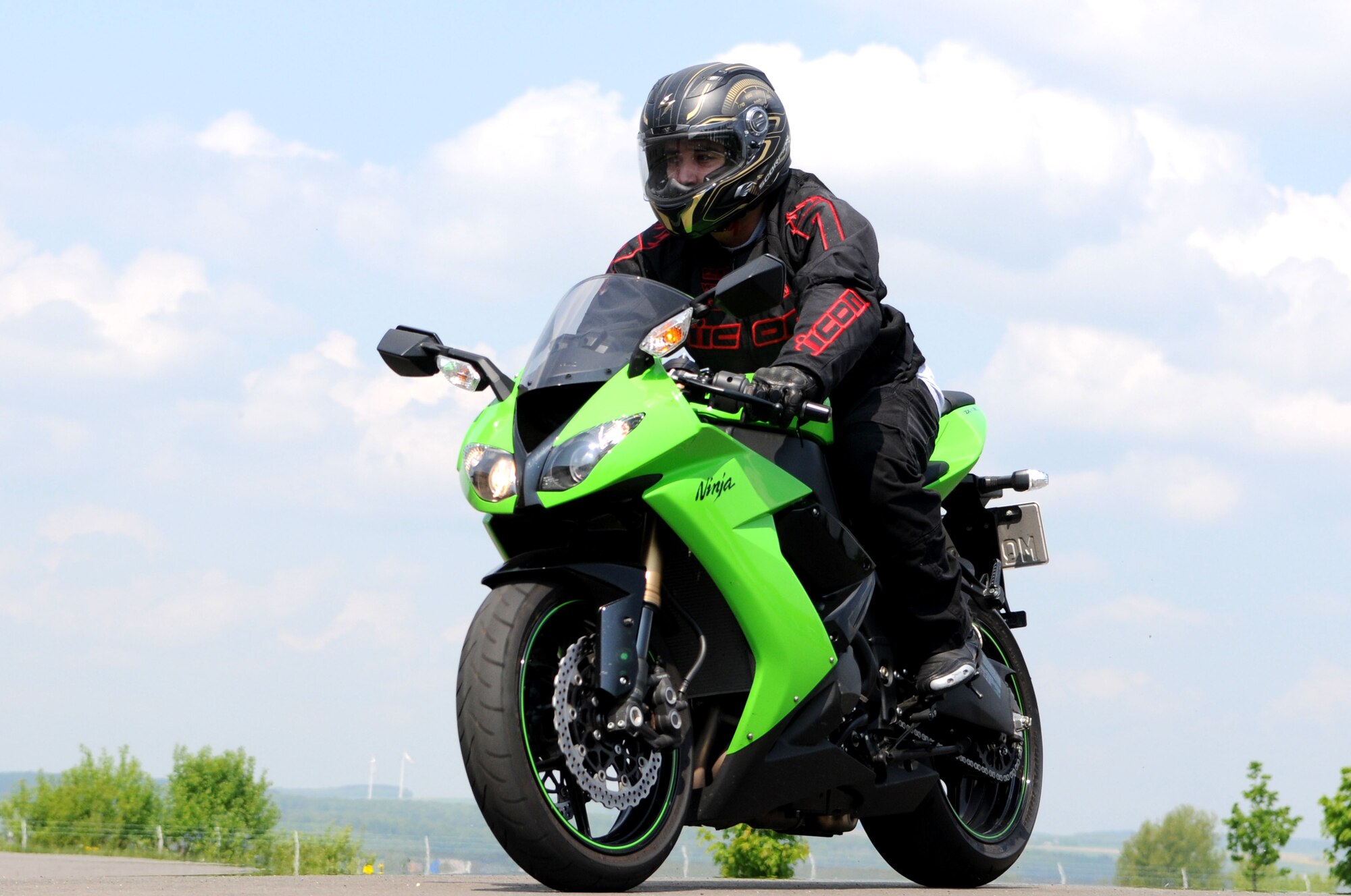 SPANGDAHLEM AIR BASE, Germany – Motorcycle riders from the 52nd Fighter Wing depart the Saber Driving Range after participating in Motorcycle Safety Day May 1. The event offered base riders an opportunity to practice motorcycle safety exercises. The event was sponsored by the 52nd FW Safety Office, the Eifel Riders and the Green Knights. (U.S. Air Force photo by Staff Sgt. Logan Tuttle)