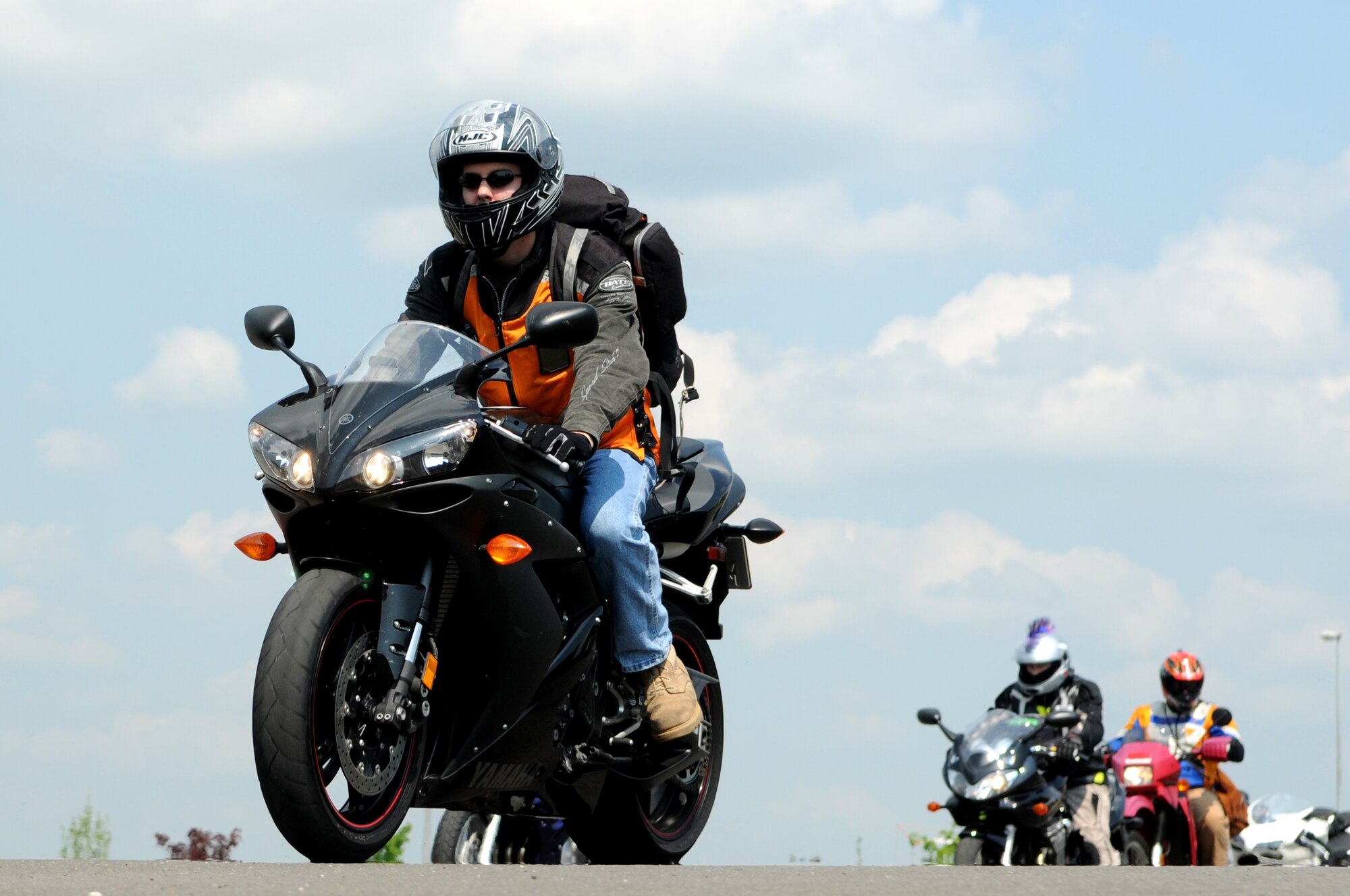 SPANGDAHLEM AIR BASE, Germany – Motorcycle riders from the 52nd Fighter Wing depart the Saber Driving Range after participating in Motorcycle Safety Day May 1. The event offered base riders an opportunity to practice motorcycle safety exercises. The event was sponsored by the 52nd FW Safety Office, the Eifel Riders and the Green Knights. (U.S. Air Force photo by Staff Sgt. Logan Tuttle)