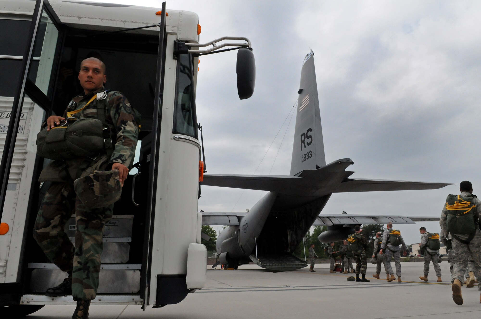 United States Air Force Staff Sgt. Gabriel Rodriguez, 786th Security Forces paratrooper, gets off the bus to board a C-130E Hercules on Ramstein Air Base, Germany, April 30, 2009. The jump was conducted as part of the celebration for the Contingency Readiness Group's 10th anniversary. (U.S. Air Force photo by Airman 1st Class Grovert Fuentes-Contreras)