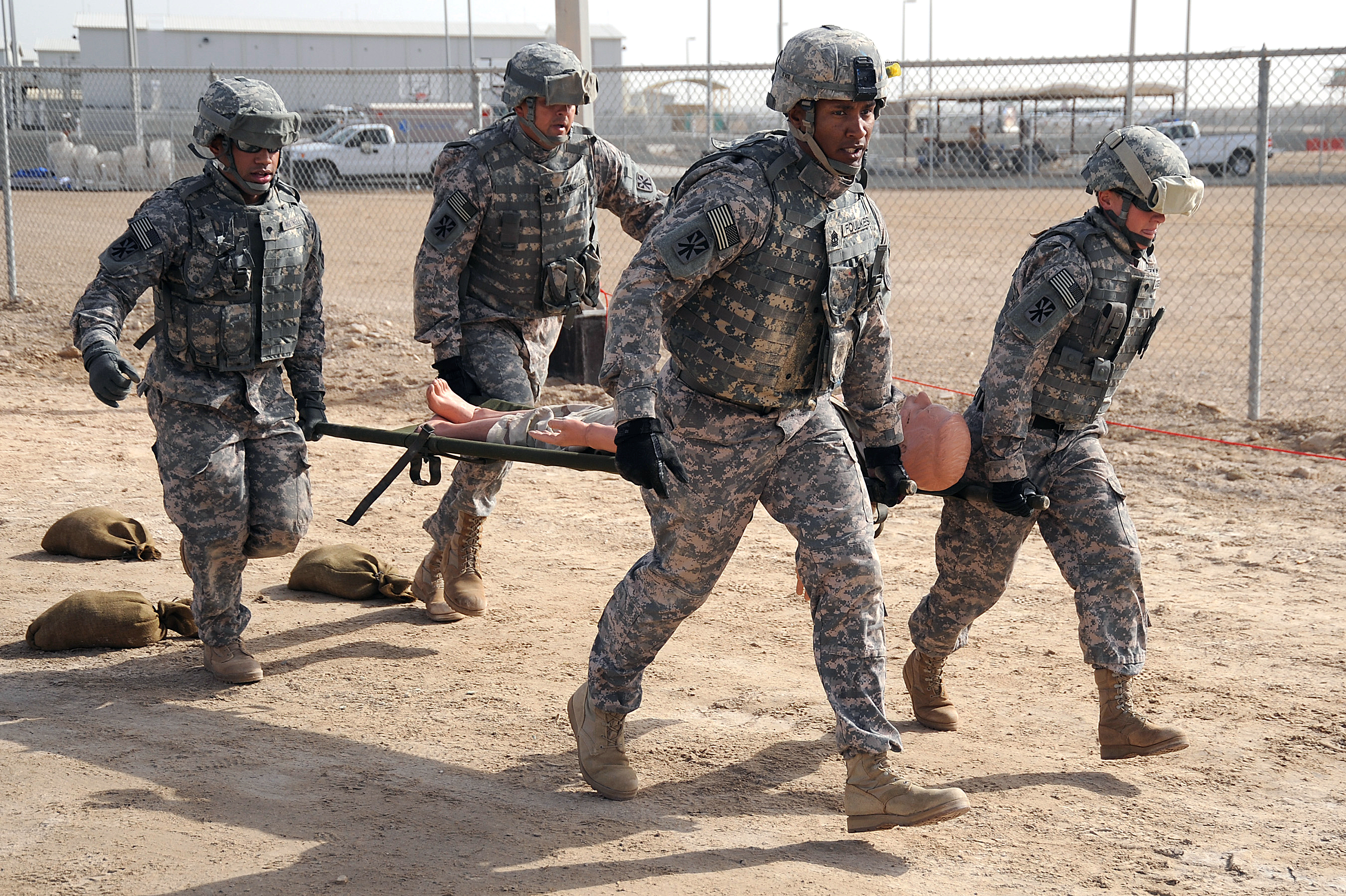 Stretcher carry new arrivals