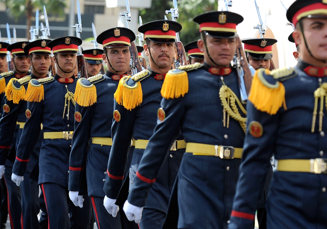Members of the Egyptian Honor Guard march away after greeting U.S. Defense Secretary Robert M. Gates upon his arrival at the Ministry of Defense in Cairo, Egypt, May 5, 2009.