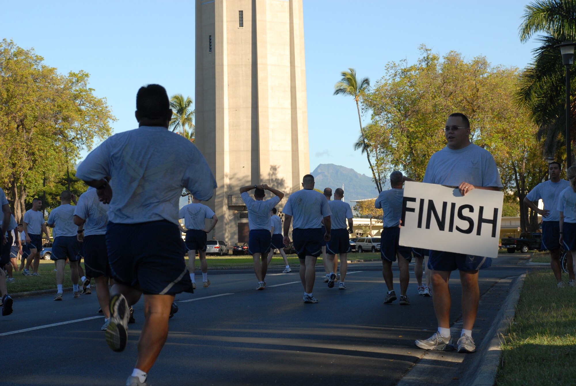HICKAM AIR FORCE BASE, Hawaii – Airmen finish the Warrior Run at the Freedom Tower Mall May 1. (U.S. Air Force photo/Staff Sgt. Erin Smith)