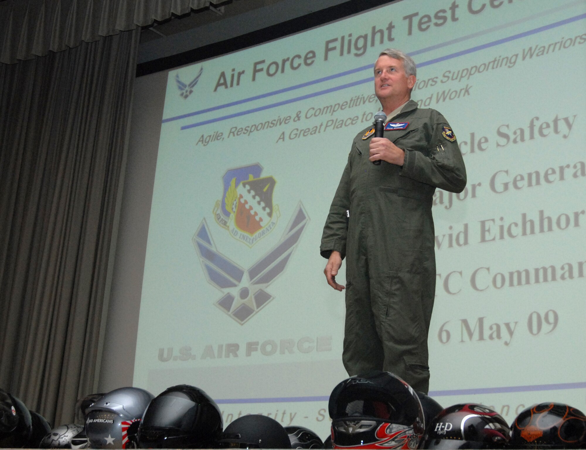 Maj. Gen. David Eichhorn, Air Force Flight Test Center commander, talks to Edwards military and civilian motorcycle riders during the AFFTC Safety mandatory safety briefing at the base theater May 6. Some of the most common motorcycle incidents and accidents include cases in sport bike riding, and crossing intersections. (U.S. Air Force photo/Senior Airman Julius Delos Reyes)