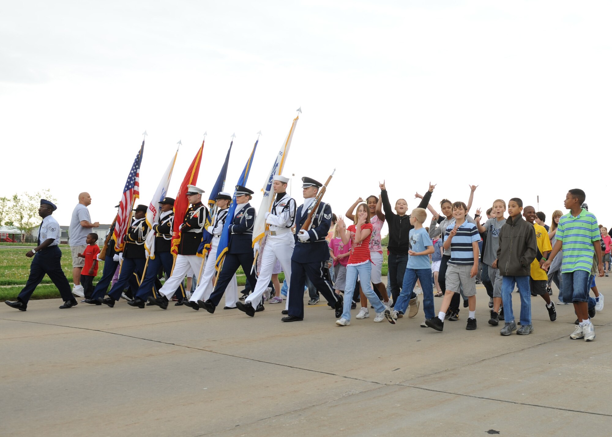 SCOTT AIR FORCE BASE, Ill. --Students from Scott Elementary walk in the Week of the Military Child parade at Scott April 27. Faculty, students and servicemembers walked through Patriots Landing.(U.S. Air Force photo/Staff Sgt. Paul Villanueva II) 