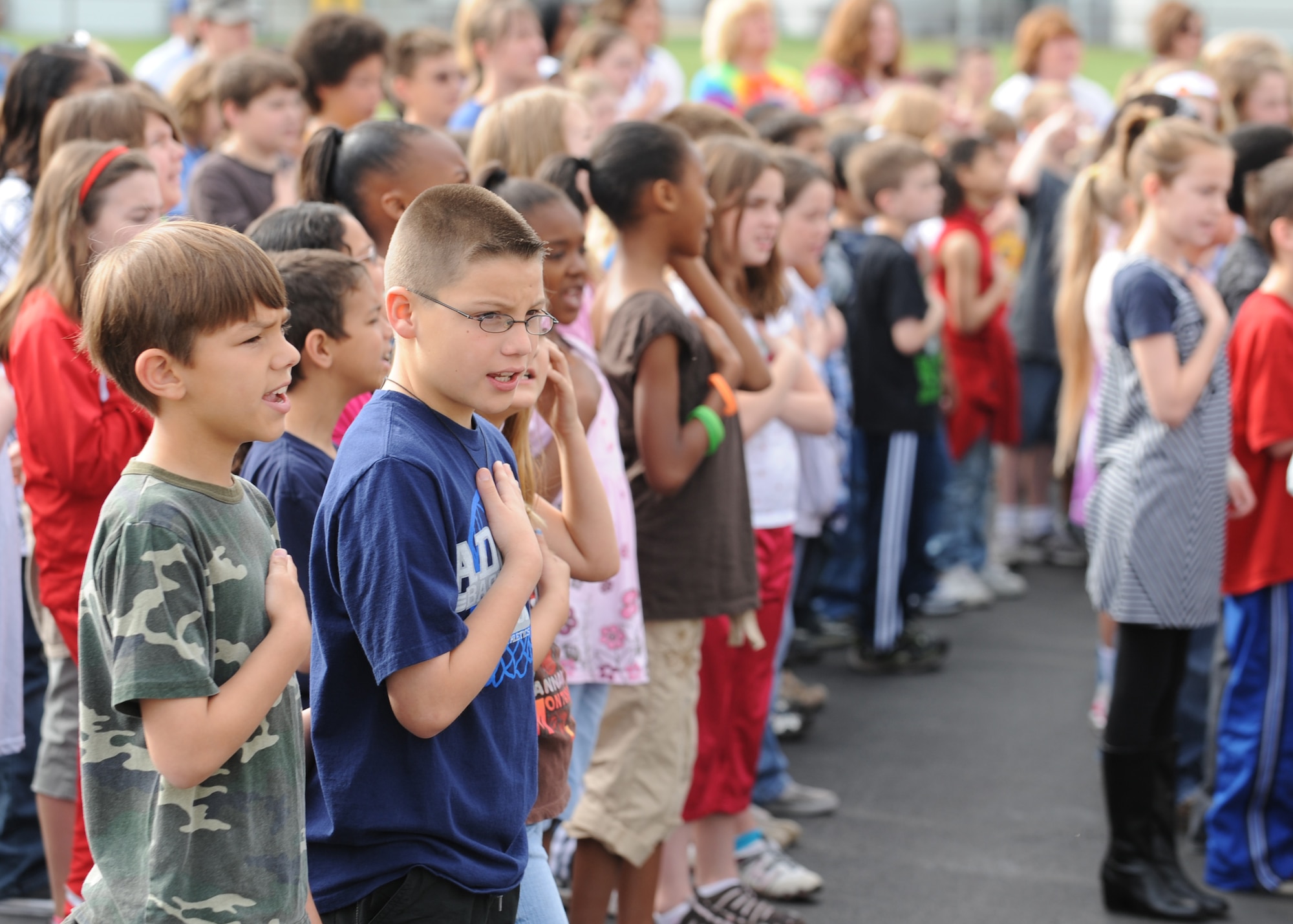 SCOTT AIR FORCE BASE, Ill. --Students recite the Pledge of Allegiance before school starts at Scott Elementary May 1.  Team Scott celebrated Month of the Military Child in April.  The designation raises awareness and applauds children of servicemembers for their courage. (U.S. Air Force photo/Staff Sgt. Paul Villanueva II) 