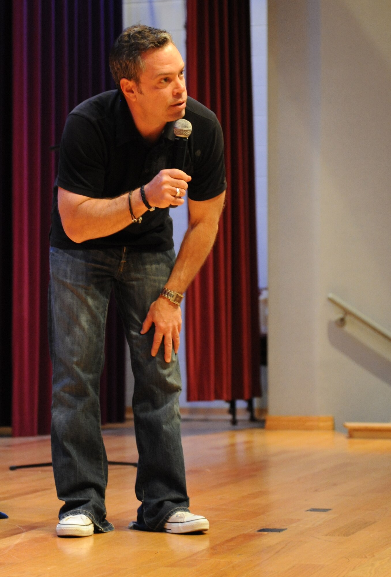 WHITEMAN AIR FORCE BASE, Mo. -- Bernie McGrenahan, Stand- up Comedian and creator of the Comedy is the Cure, presents “Happy Hour” to members of Team Whiteman May 5. Mr. McGrenahan was brought to Whiteman to give comedy with a message to the entire Airman population 26 and younger. He has traveled all over the world to more than twenty countries and has passed his life lessons along to millions. McGrenahan's message increases knowledge of Alcohol Awareness and Sexual Assault. (U.S. Air Force photo/Airman 1st Class Carlin Leslie)