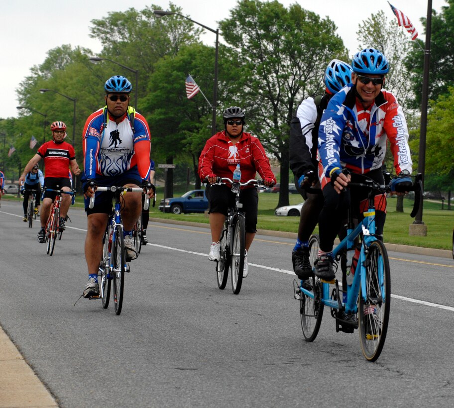 Participants in the wounded warrior soldier ride cycle on Andrews Air Force Base Md., on May 1, 2009. The wounded warriors rode from Andrews to Annapolis, Md., as a part of a four day event to raise awareness of issues that veterans are challenged with when they return wounded from the war and for many, the soldier ride provides an important step in their return to an active lifestyle. (U.S. Air Force photo by Airmen First Class Melissa V. Rodrigues)