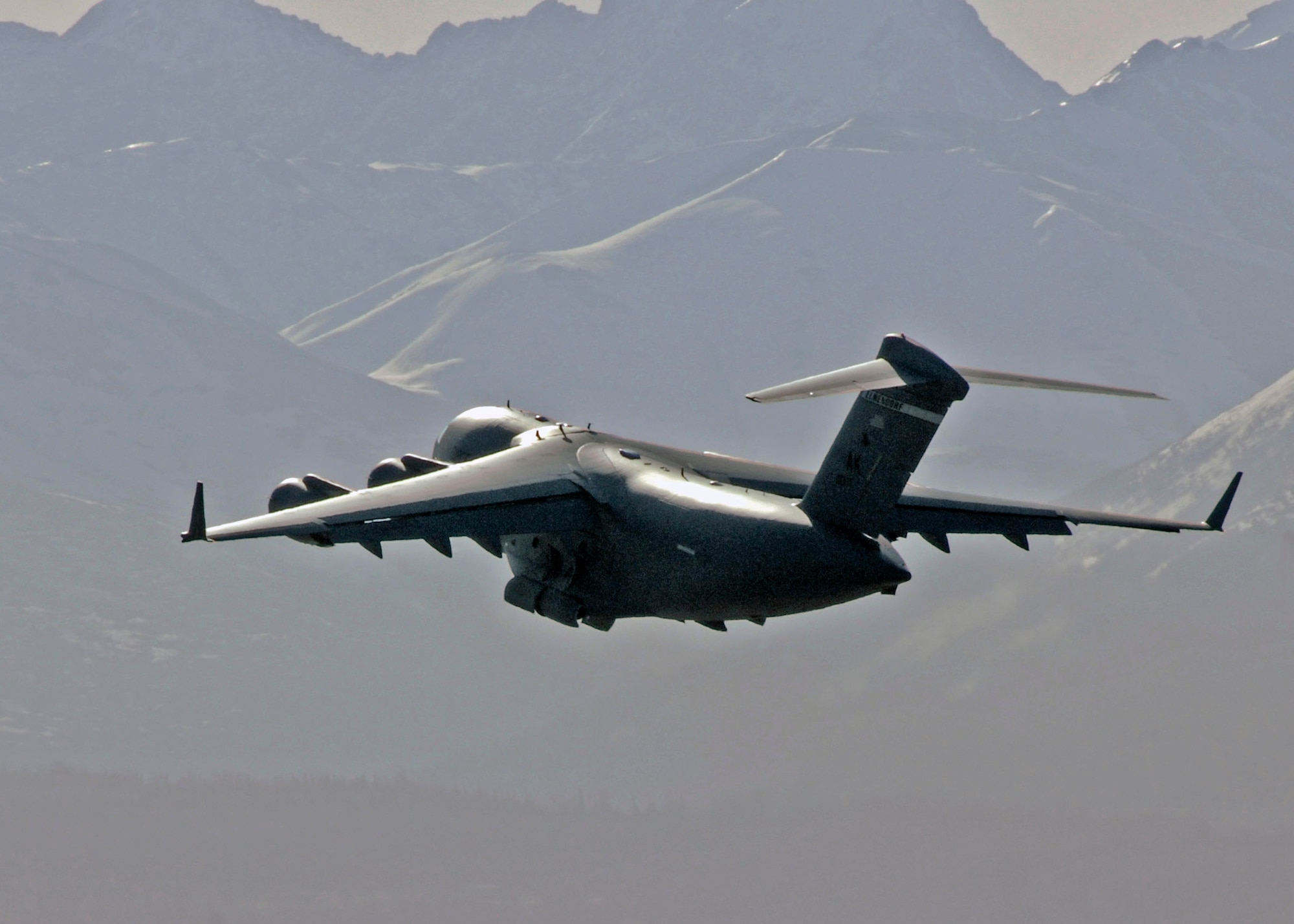 A C-17 Globemaster III takes off during Red Flag-Alaska 2009 April 30 at Elmendorf Air Force Base, Alaska. This exercise enabled flying squadrons to enhance their fighting capabilities in simulated combat sorties in a realistic threat environment. The 10-day exercise ended May 1. (U.S. Air Force photo/Senior Airman Laura Turner) 
