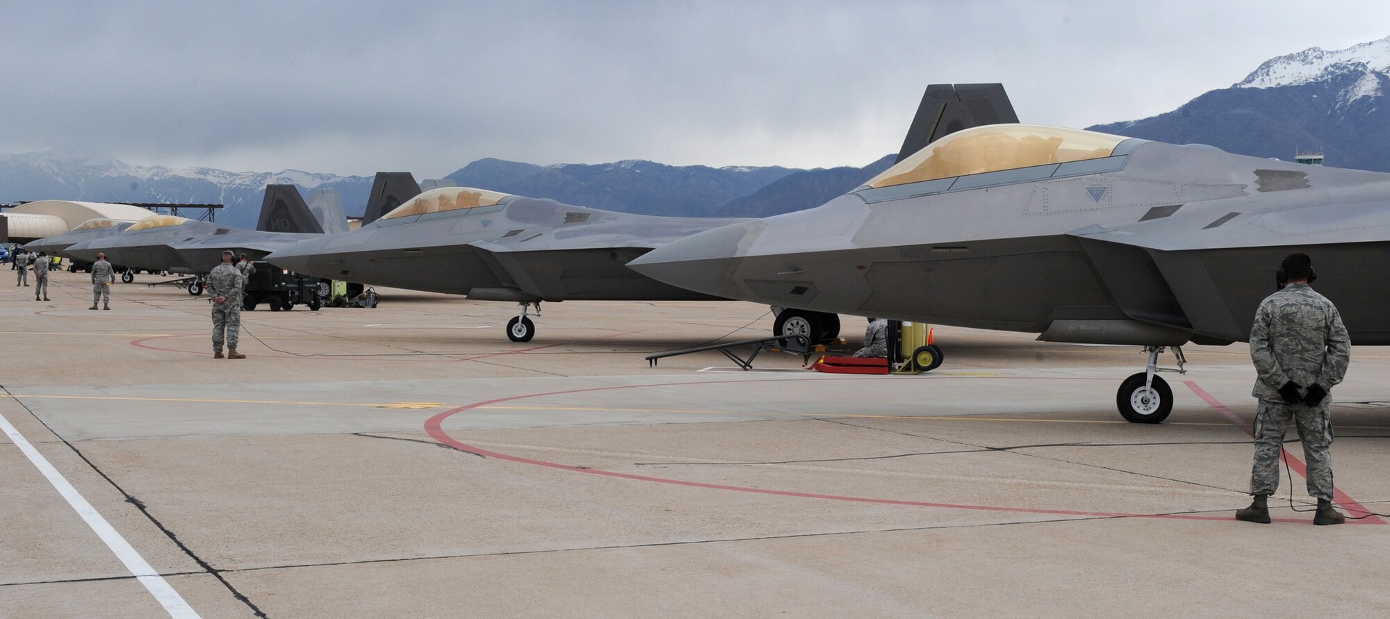 F-22's from Holloman Air Force Base are lined up before take-off during Combat Hammer at Hill AFB, Utah, May 5. Combat Hammer performs sixty-five percent of there operations at the Utah Test and Training Range.  (U.S. Air Force photo/Senior Airman Michael Means)