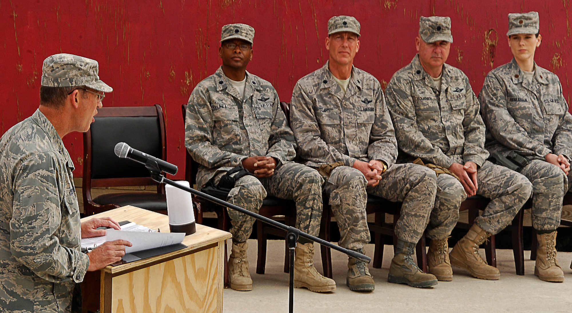 Col. James Reed, 755th Air Expeditionary Group commander, explains the role of four new squadrons, the 655th, 755th, 855th and 955th Air Expeditionary Squadrons, to new commanders during an assumption of command ceremony at Bagram Air Field, May 5. The squadrons were stood up to provide better accountability and support for more than 1,200 Joint Expeditionary Tasking and Individual Augmentee Airmen scattered throughout Afghanistan's more than 40 forward operating bases and camps. (Air Force/Staff Sgt. Jason Lake)