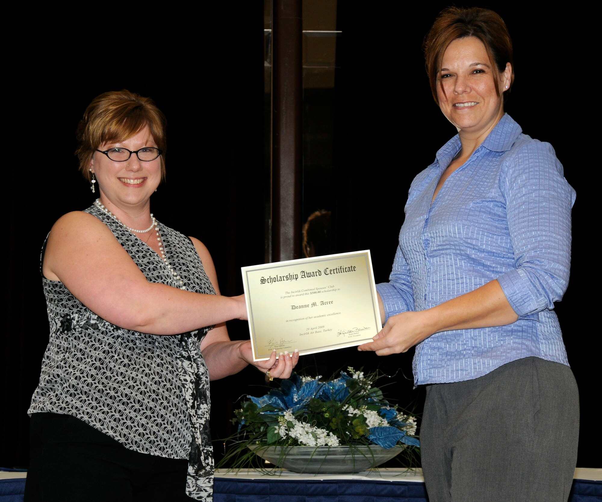 I.C.S.C. President Karla Barker and scholarship recipient  Deanne Acree. (U.S. Air Force photo/Airman 1st Class Amber Russell)