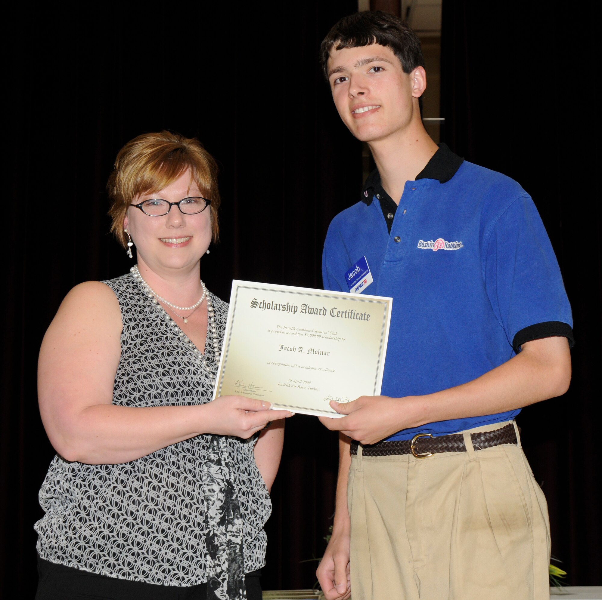 I.C.S.C. President Karla Barker and scholarship recipient  Jacob Molnar. (U.S. Air Force photo/Airman 1st Class Amber Russell)