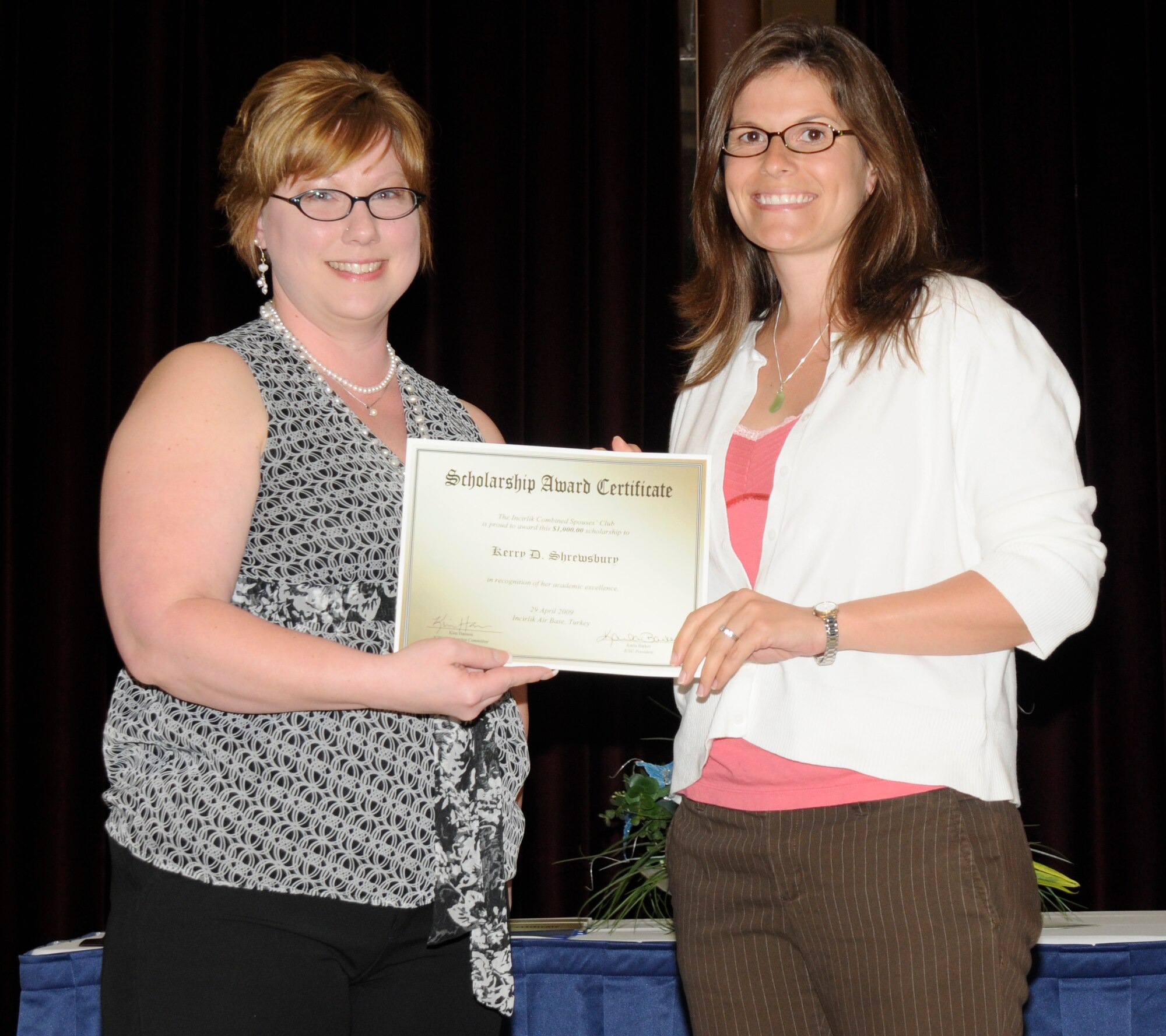I.C.S.C. President Karla Barker and scholarship recipient Kerry Shrewsbury. (U.S. Air Force photo/Airman 1st Class Amber Russell)