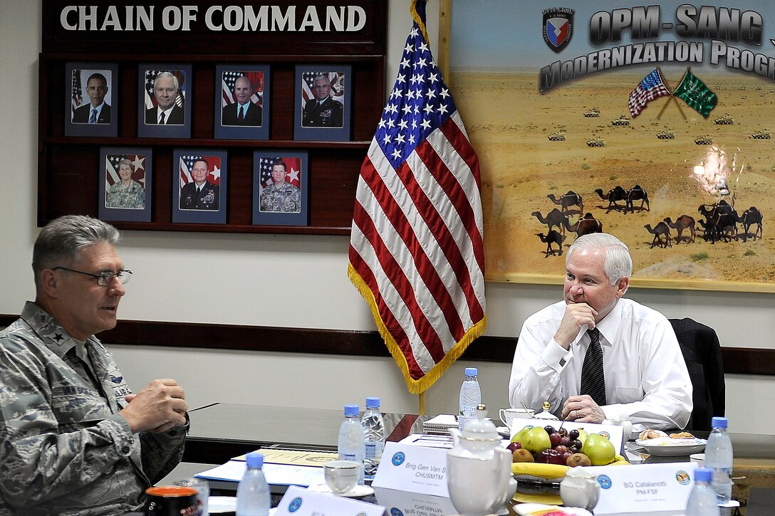 U.S. Defense Secretary Robert M. Gates listens to U.S. Air Force Maj. Gen. Paul "Dutch" Van Sickle, commanding general U.S. Military Training Mission, Eskan Village, Riyadh, Saudi Arabia, May 6, 2009. Gates is in Saudi Arabia to meet with local leaders and discuss defense issues.