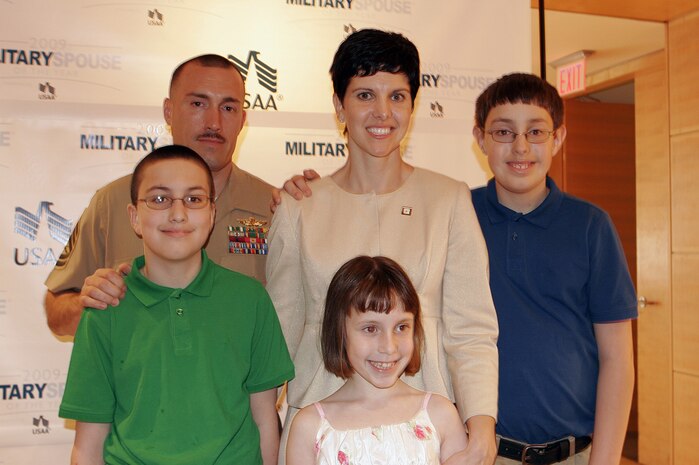The Quiero family poses for a photo after Tanya was named the 2009 Military Spouse of the Year May 7 by Military Spouse magazine and the United Services Automobile Association.