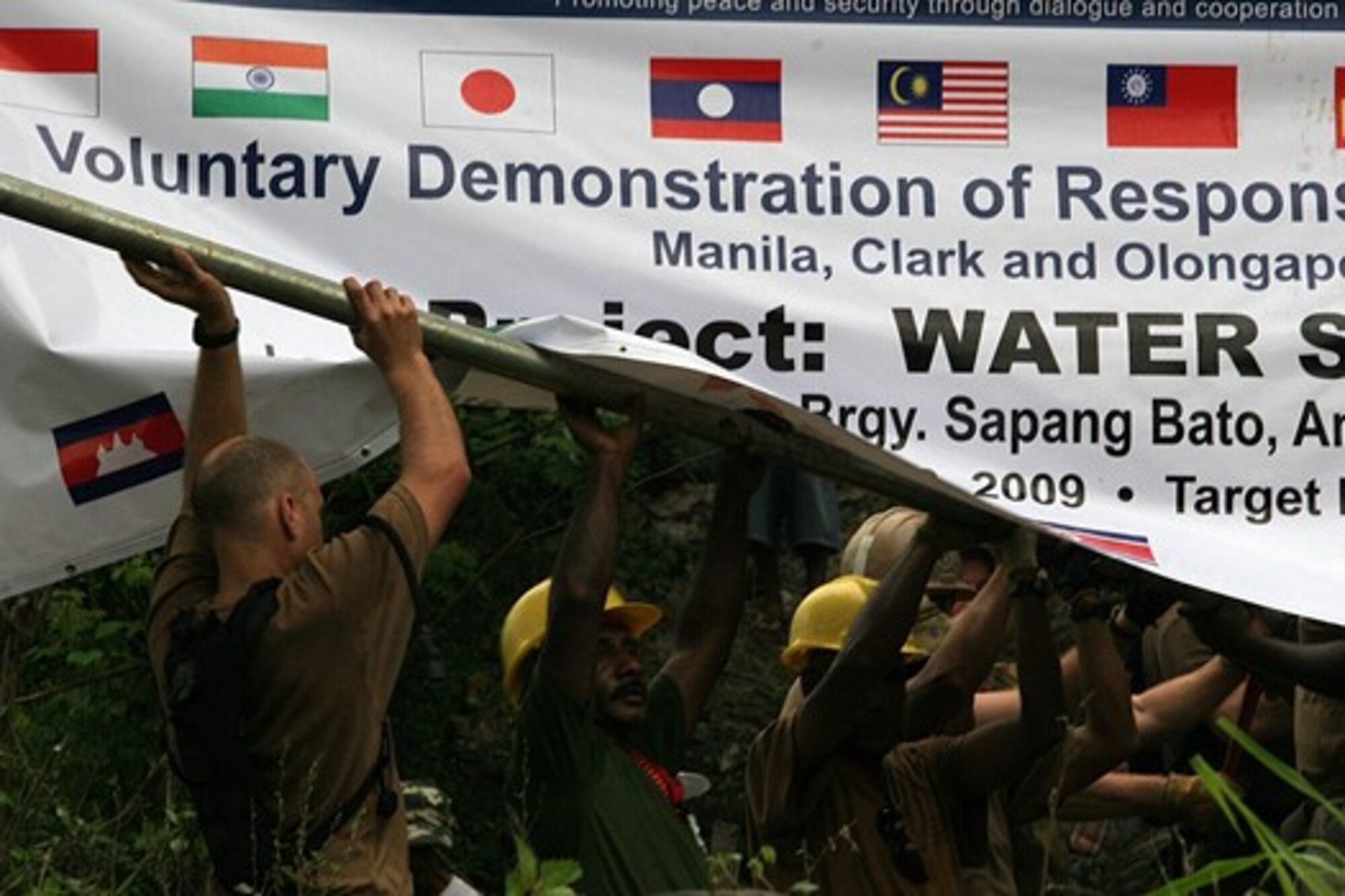 Civilians and military personnel from the United States, Japan, Australia, Indonesia and Papua-New teamed up to improve the infrastructure and water supply here as part of the 2009 Association of Southeast Asian Nations Regional Forum Voluntary Demonstration of Response on Disaster Relief, May 2.
